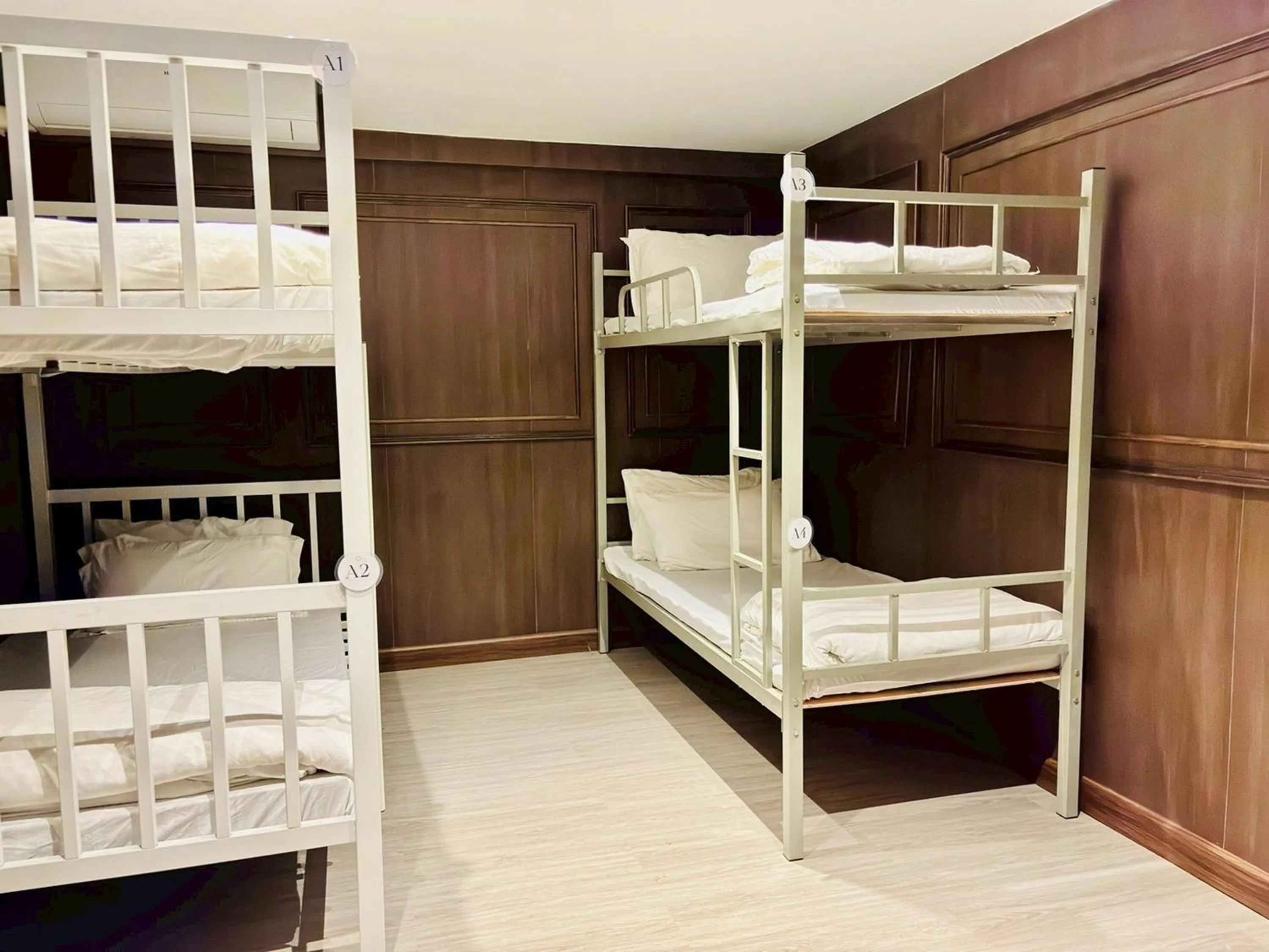 Bed in Sukhum Rajamangala-Phatthanakan Rooms