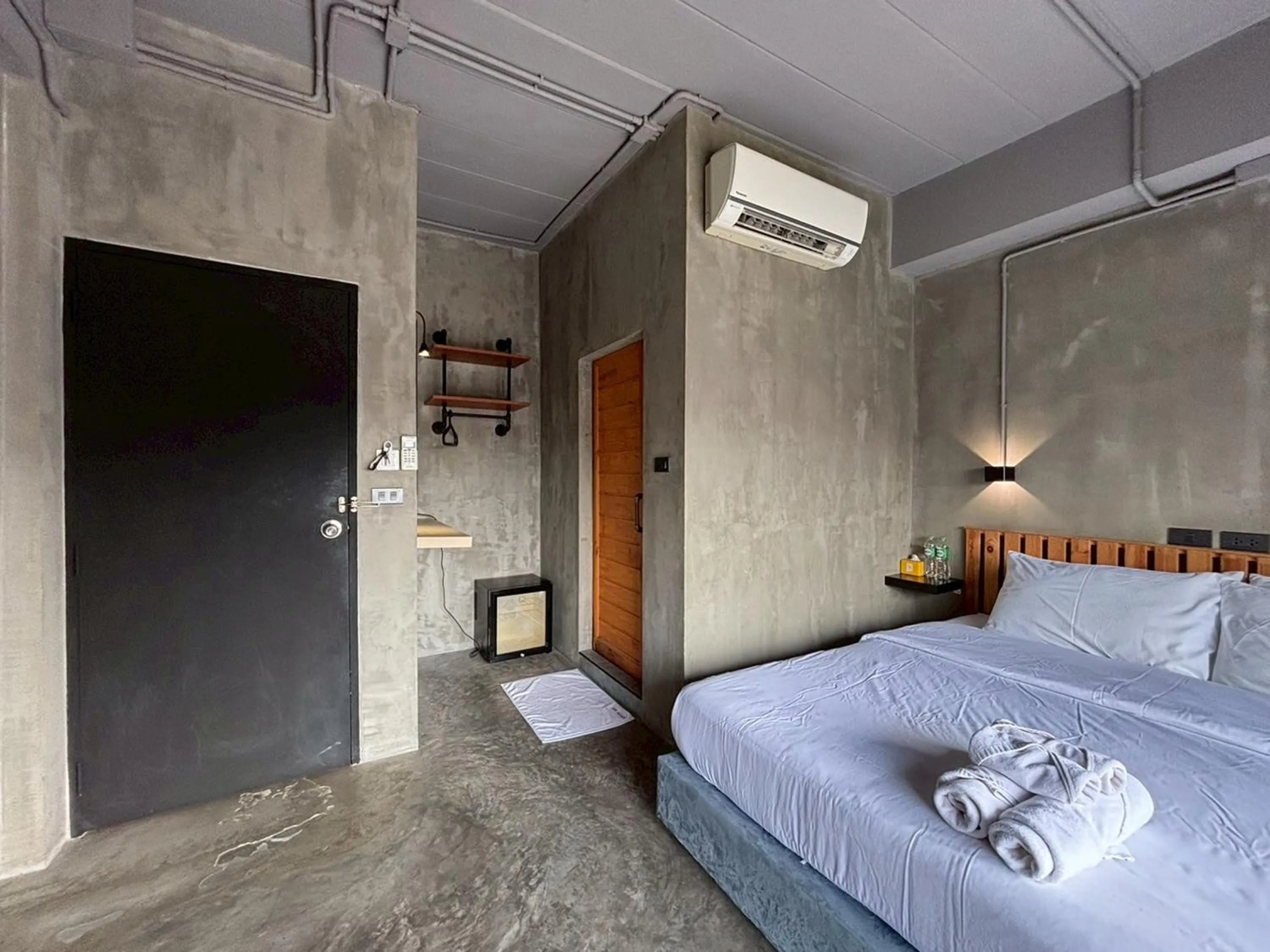 Bed in Sukhum Rajamangala-Phatthanakan Rooms