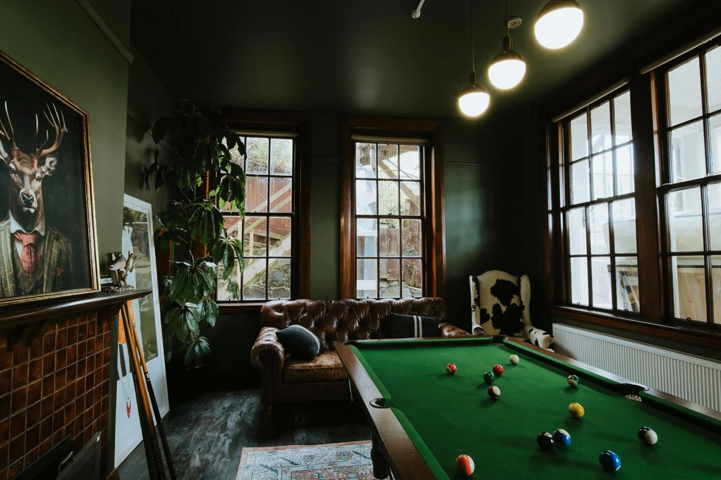 Communal lounge/ TV room in Dunedin House- Boutique Hotel