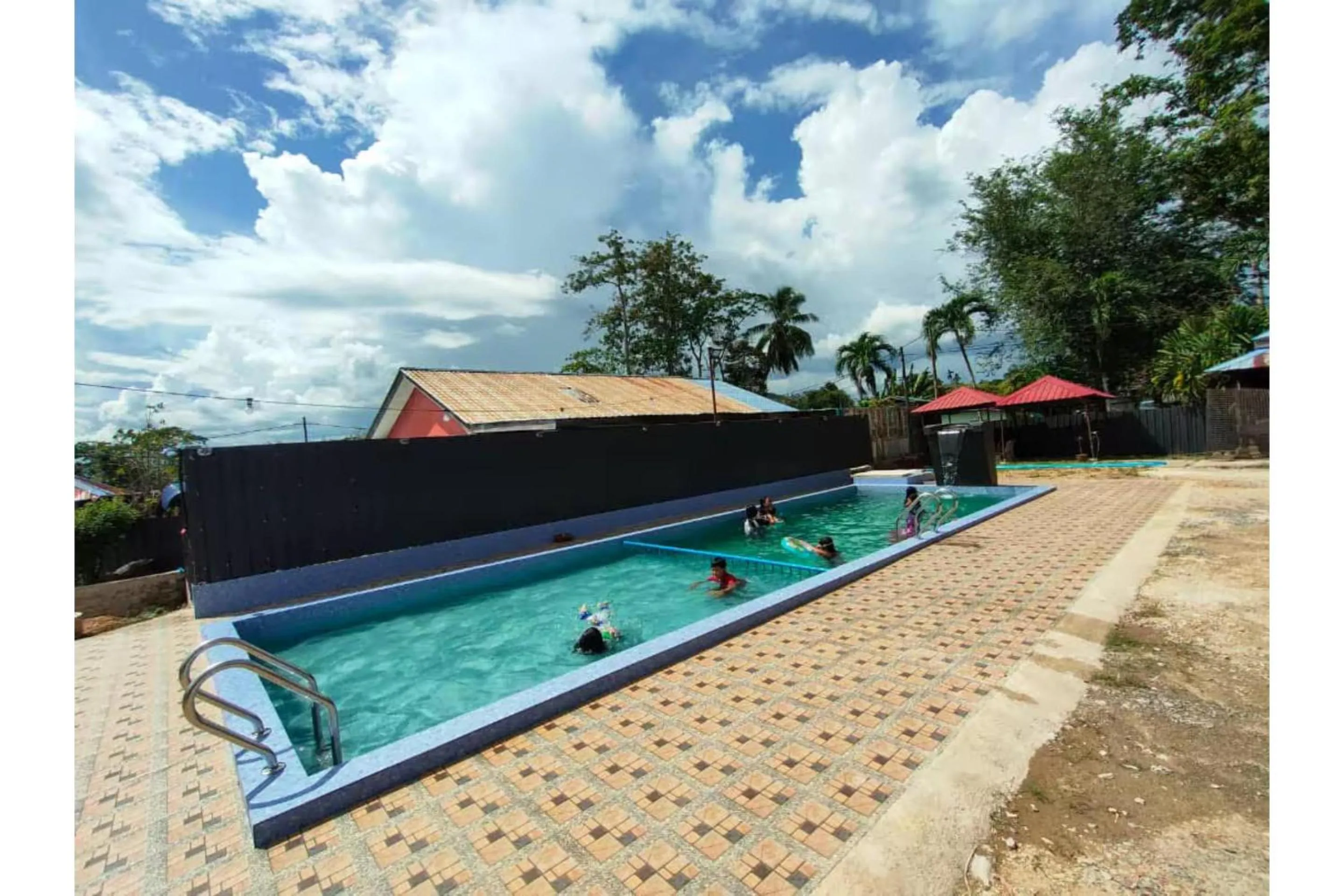 Swimming pool in Capital O 90168 Serambi Pelangi Chalet