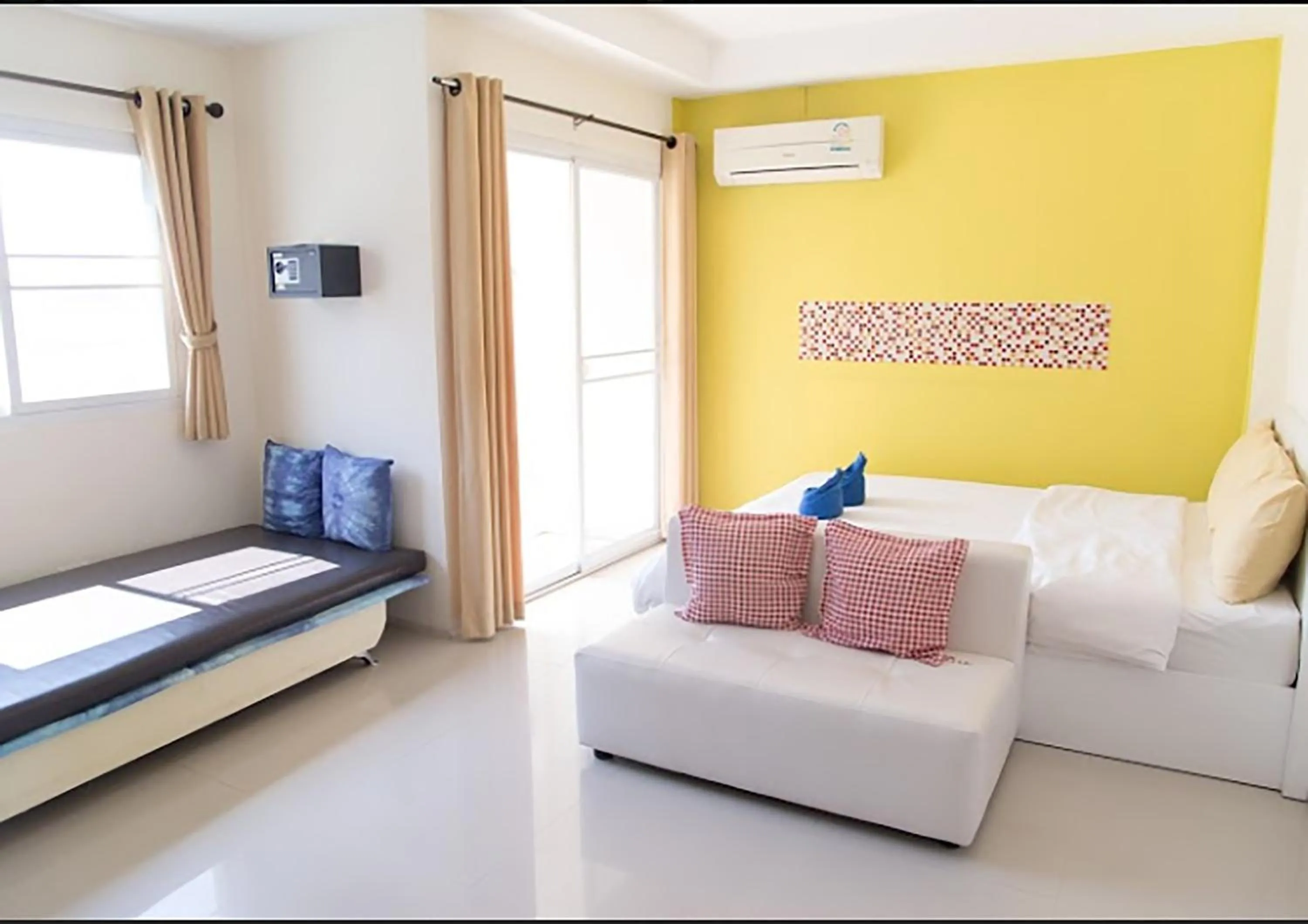 Seating area, Bed in Lotus Suite Hua Hin