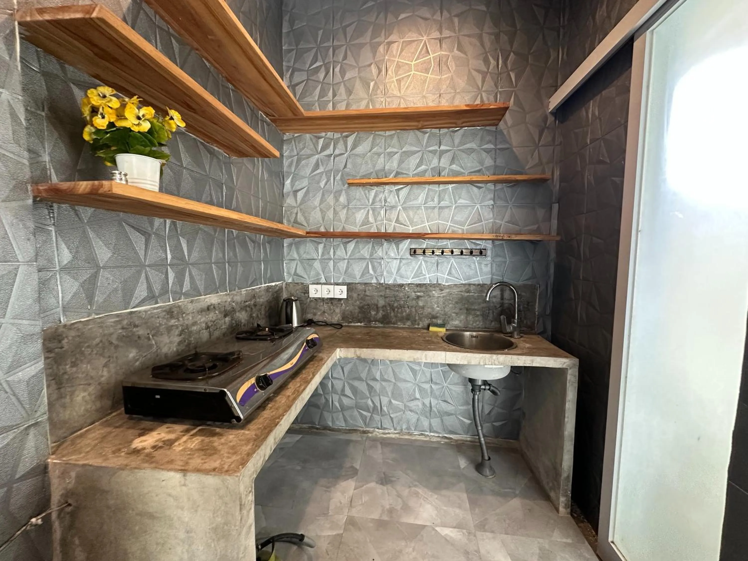 Kitchen or kitchenette in Sky Apartments and Suites