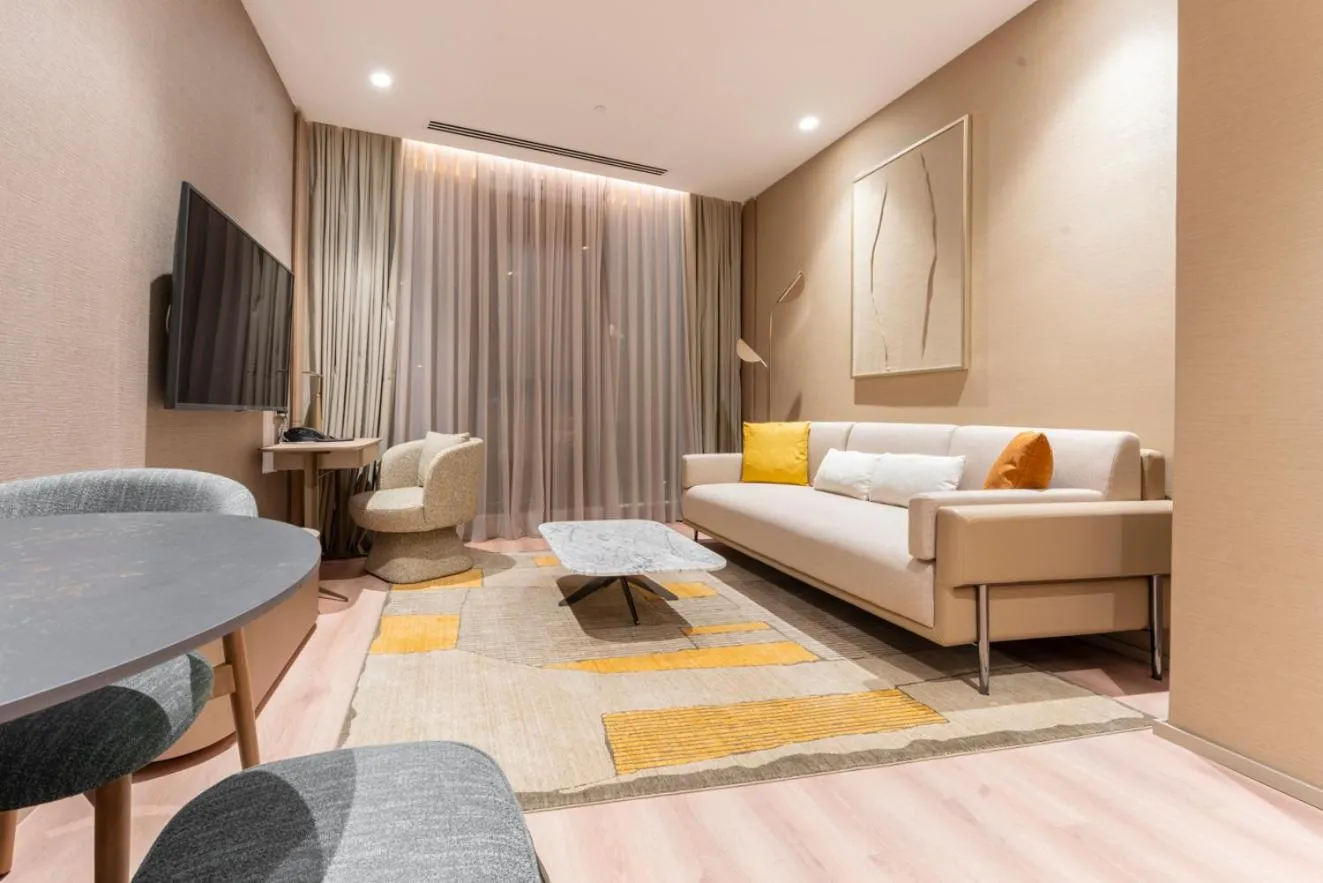 Living room, Bed in Marriott Executive Apartments Antalya