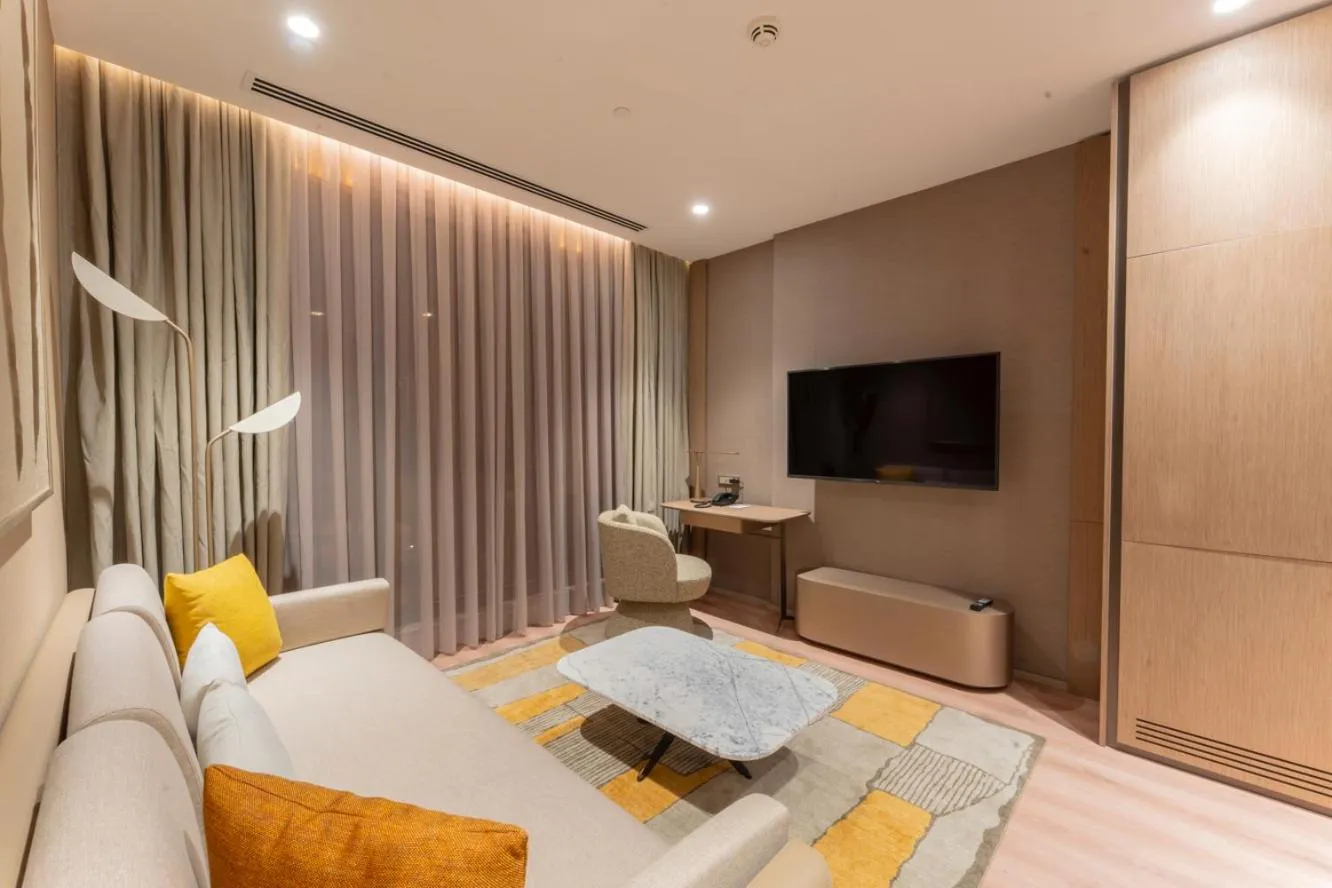 Living room, Bed in Marriott Executive Apartments Antalya