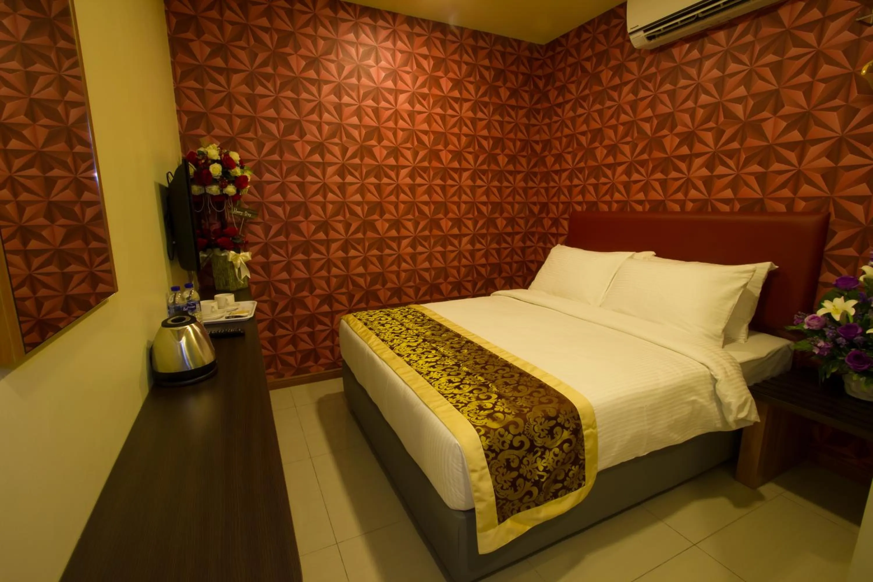 Bed in Prince 33 Hotel