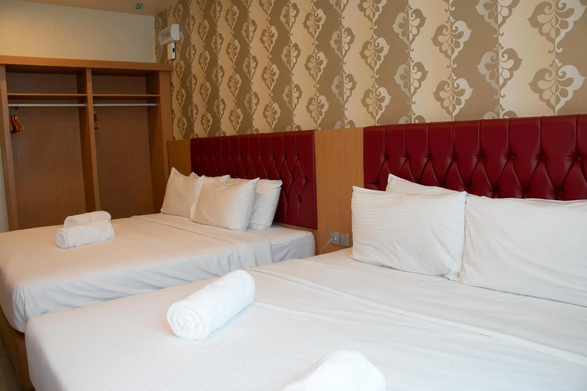 Bed in Prince 33 Hotel