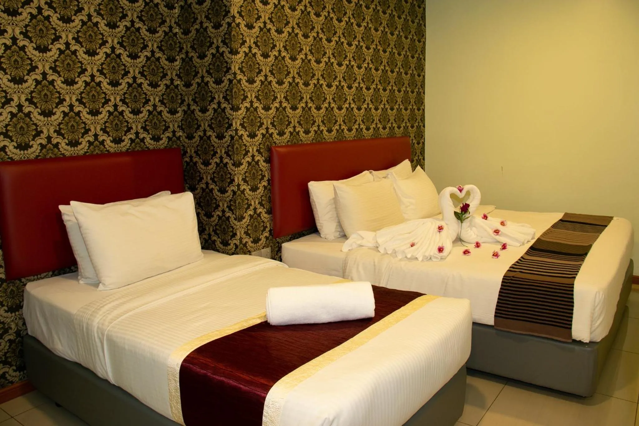 Bed in Prince 33 Hotel