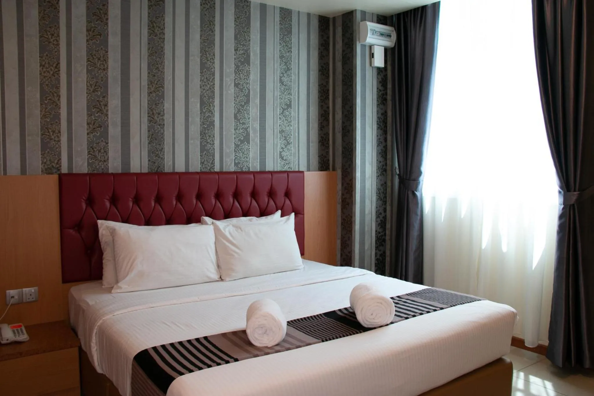 Bed in Prince 33 Hotel