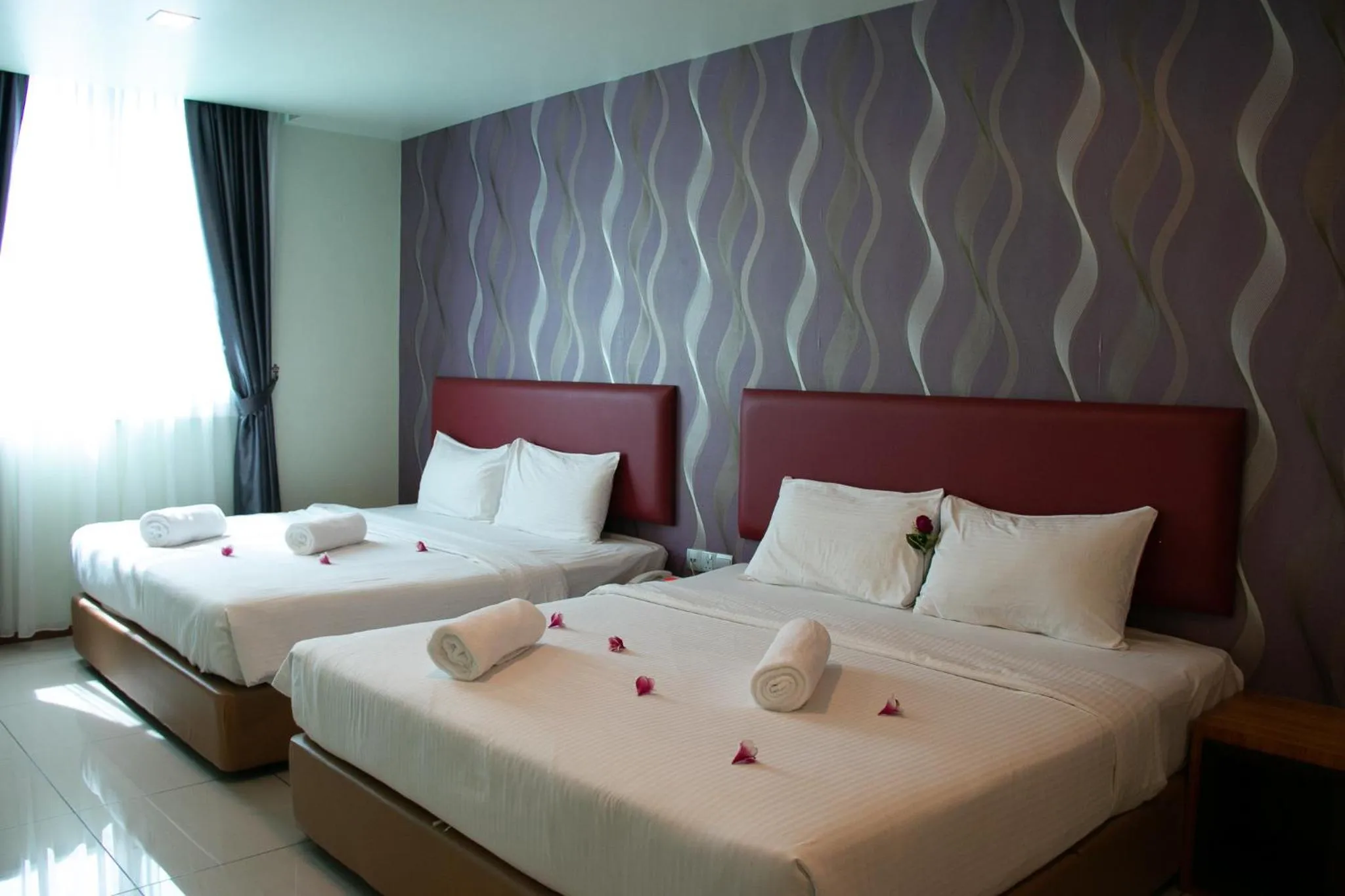 Bed in Prince 33 Hotel