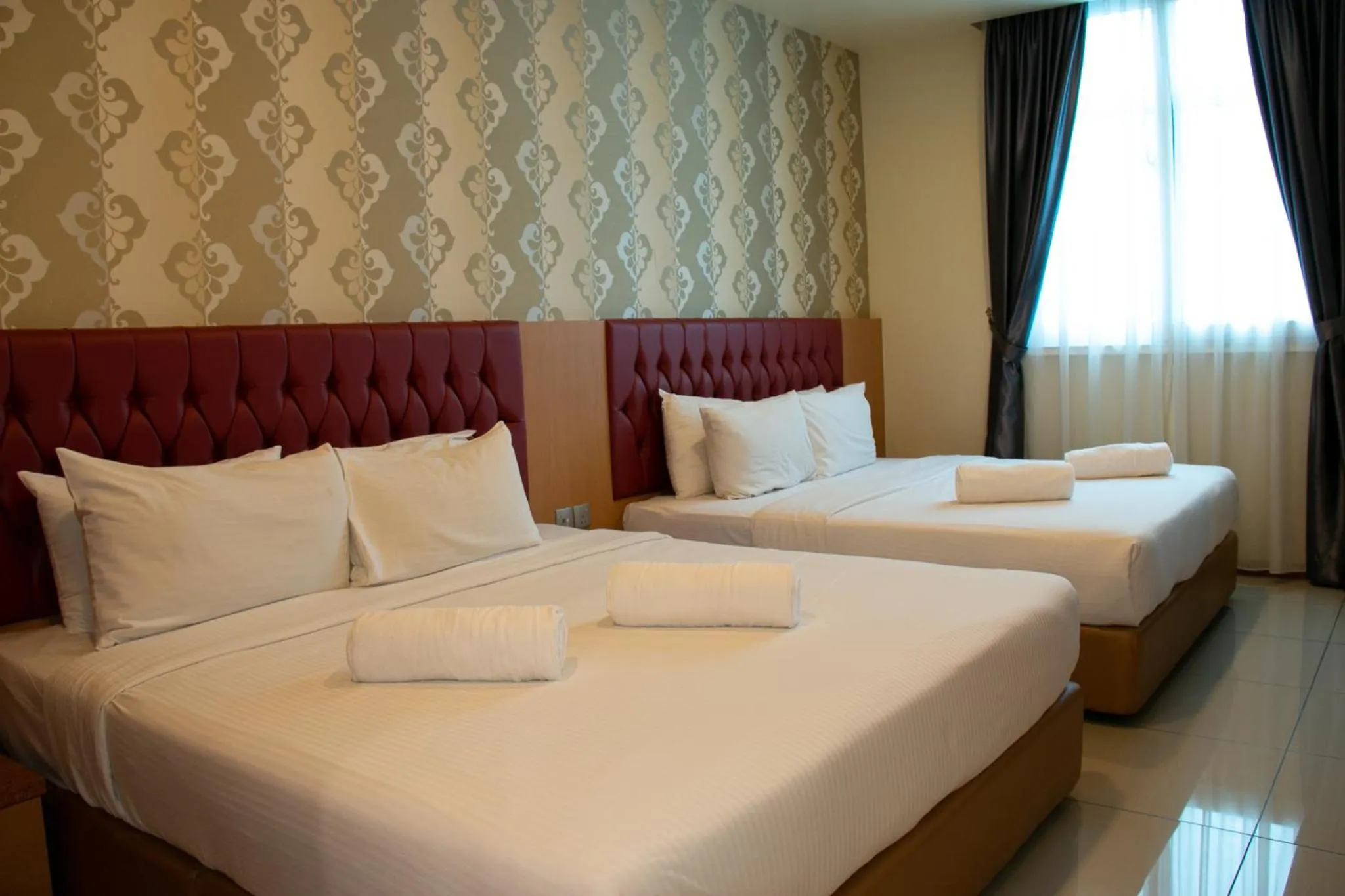 Bed in Prince 33 Hotel