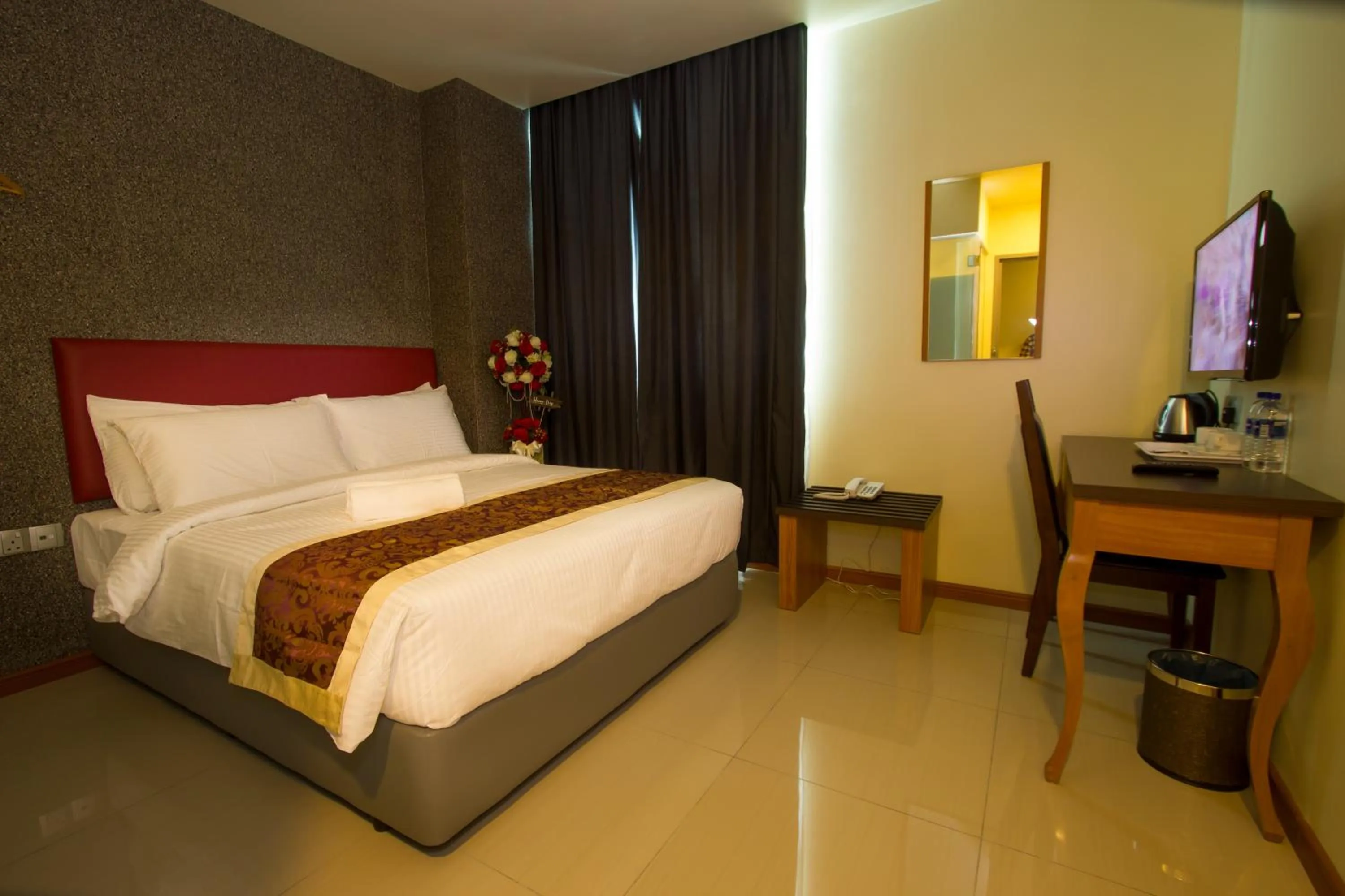 Bed in Prince 33 Hotel