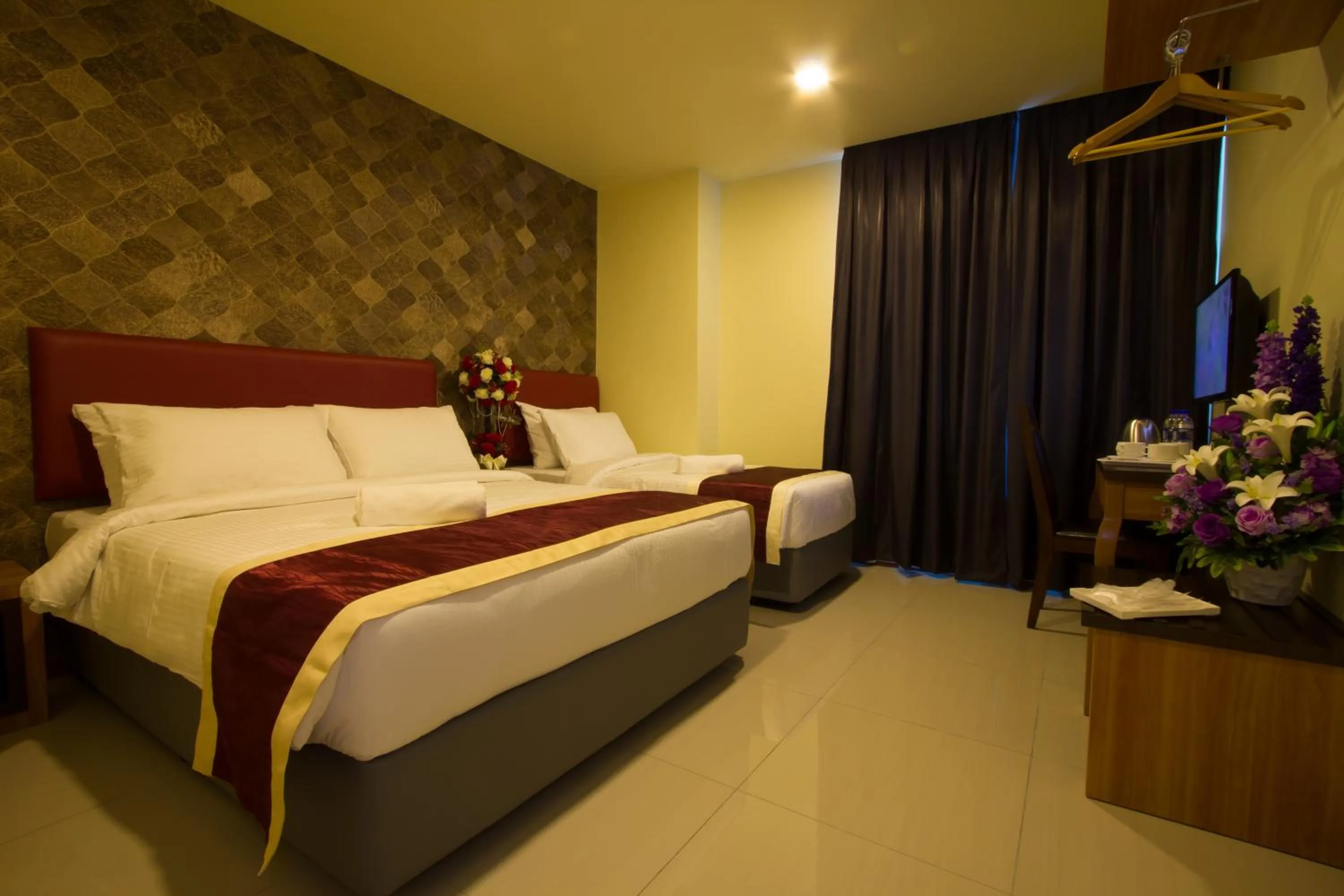 Bed in Prince 33 Hotel