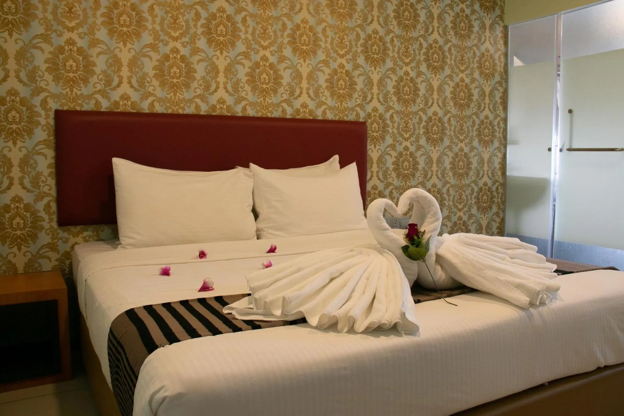 Bed in Prince 33 Hotel