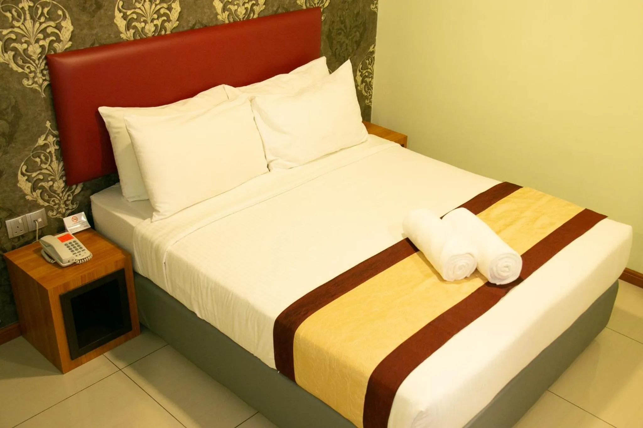 Bed in Prince 33 Hotel