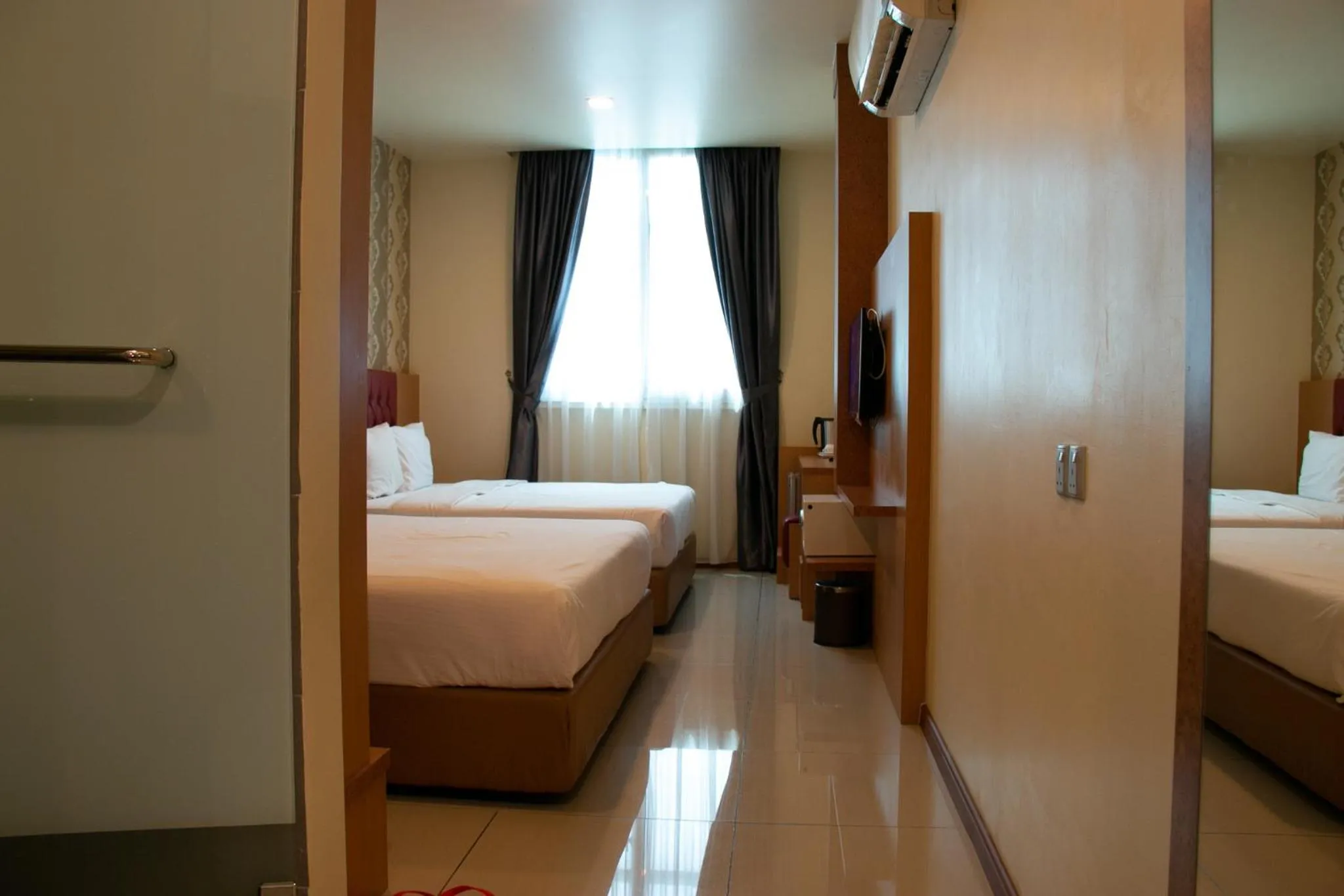 Bed in Prince 33 Hotel