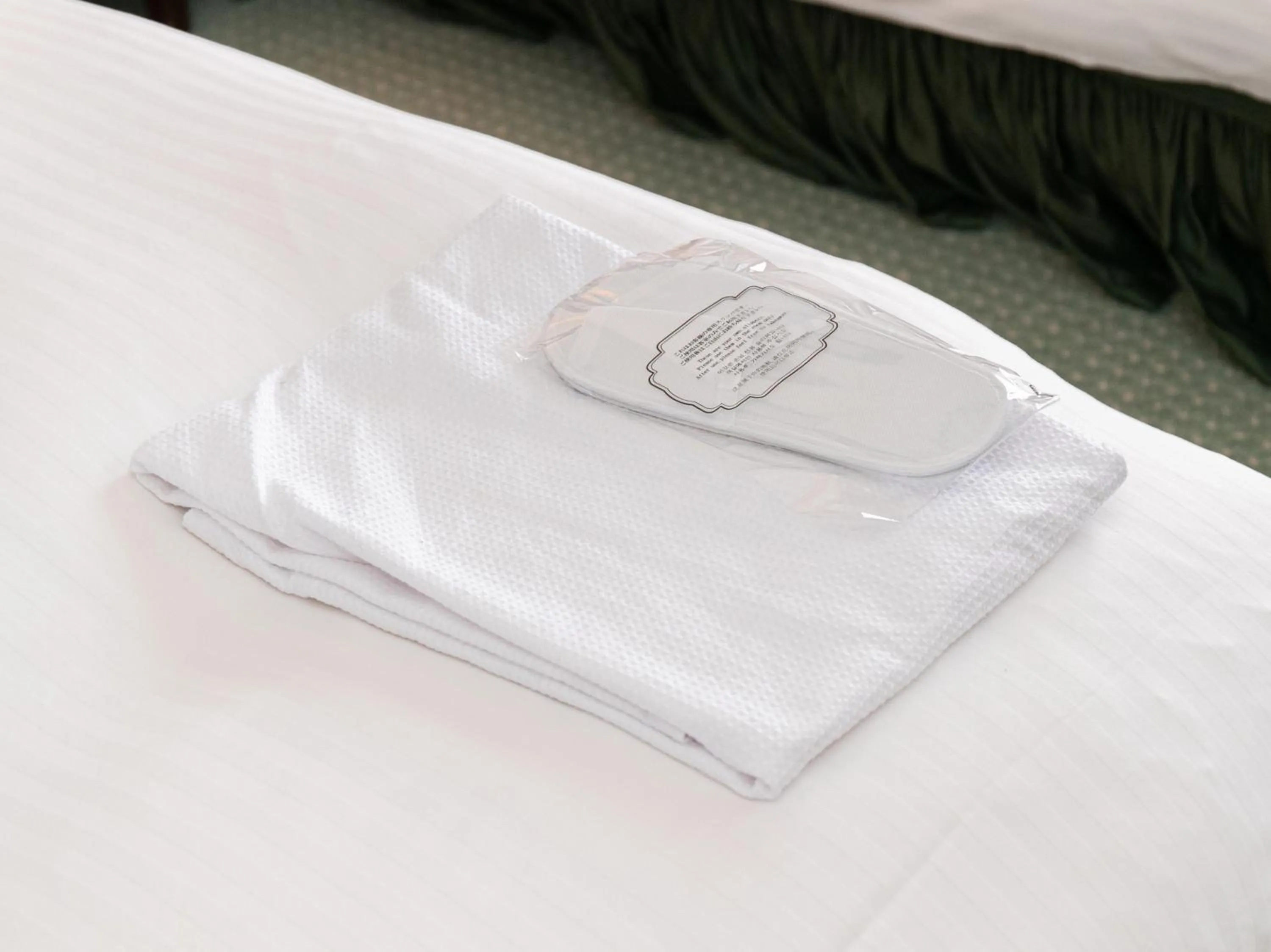 towels, Bed in Victoria Inn Nagasaki