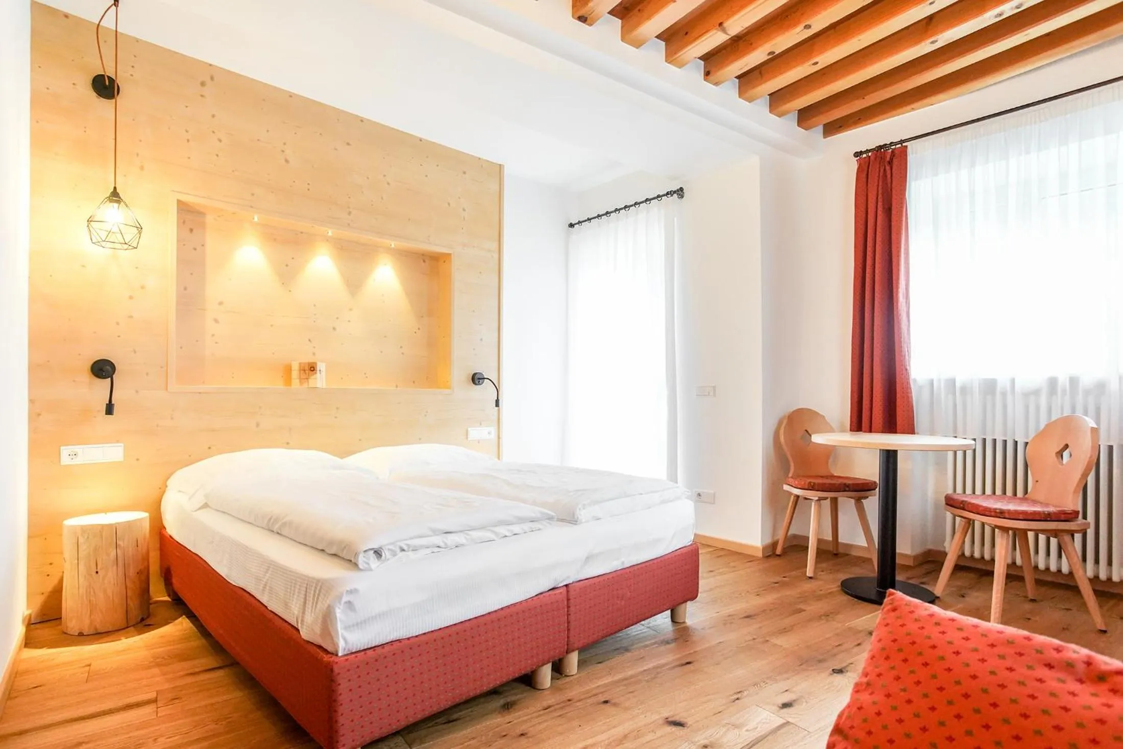 Bed in Berggasthof Locanda Alpina Dorfner