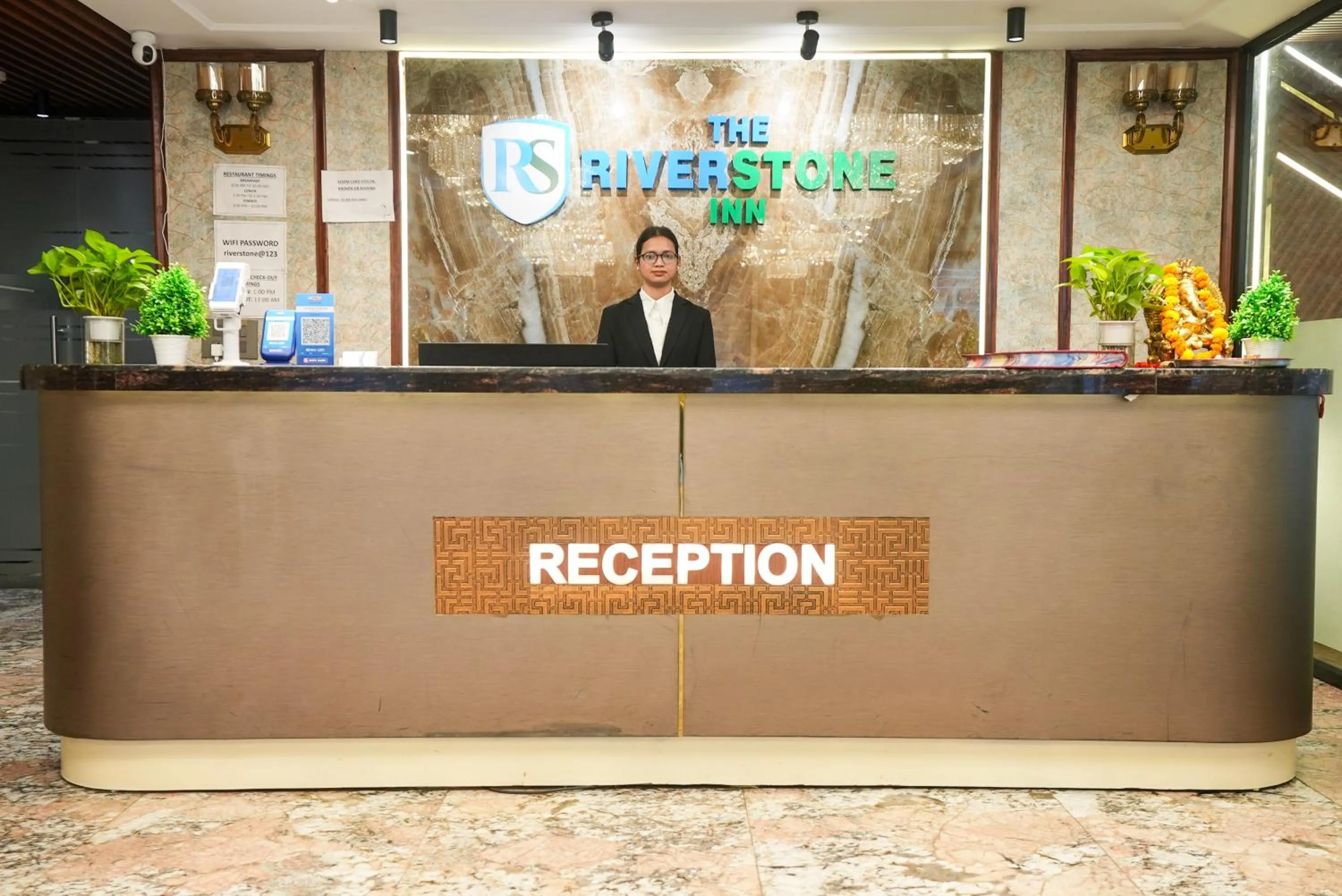 Property logo or sign in The Riverstone Inn