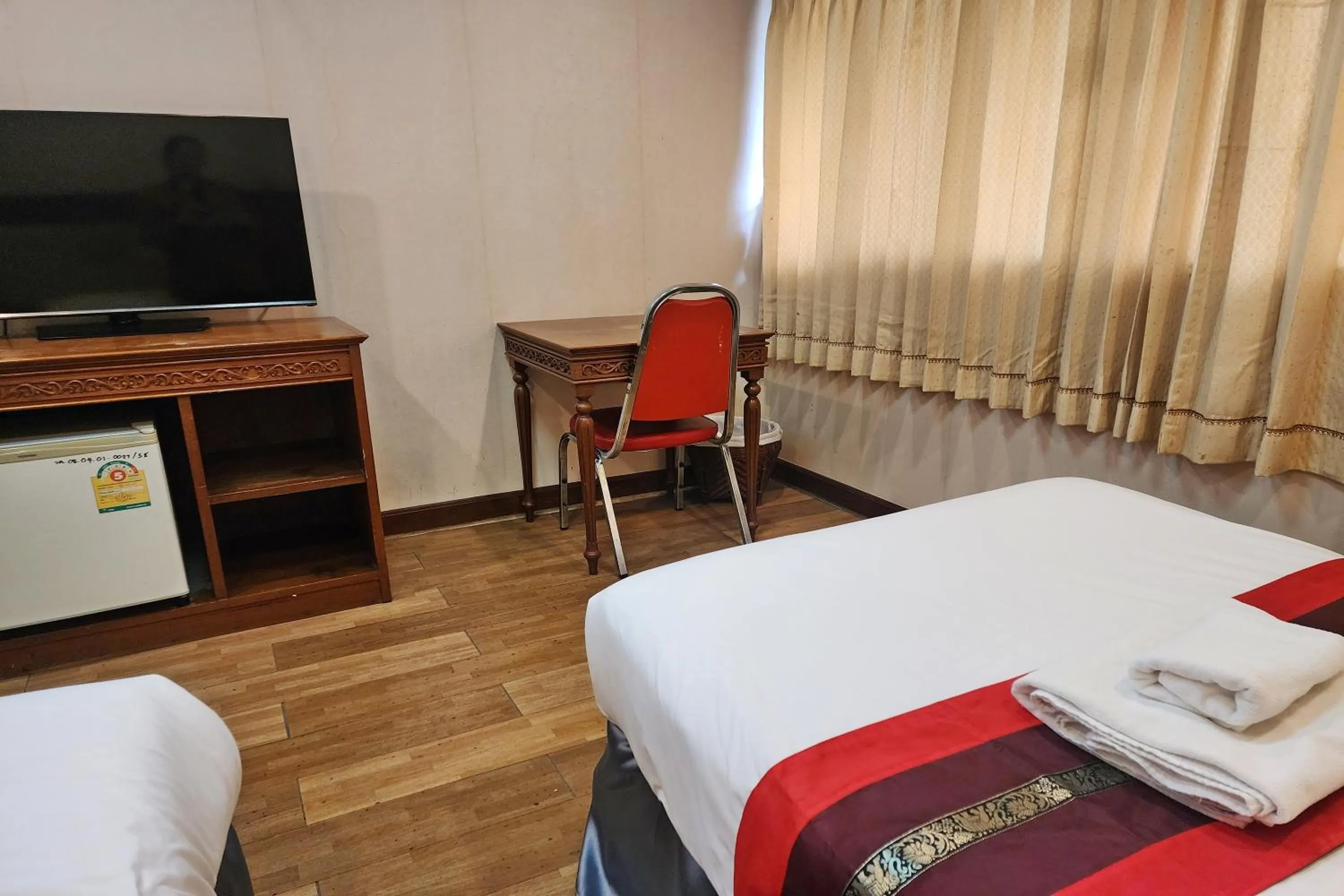 Bed in Suan Sunandha Palace Hotel