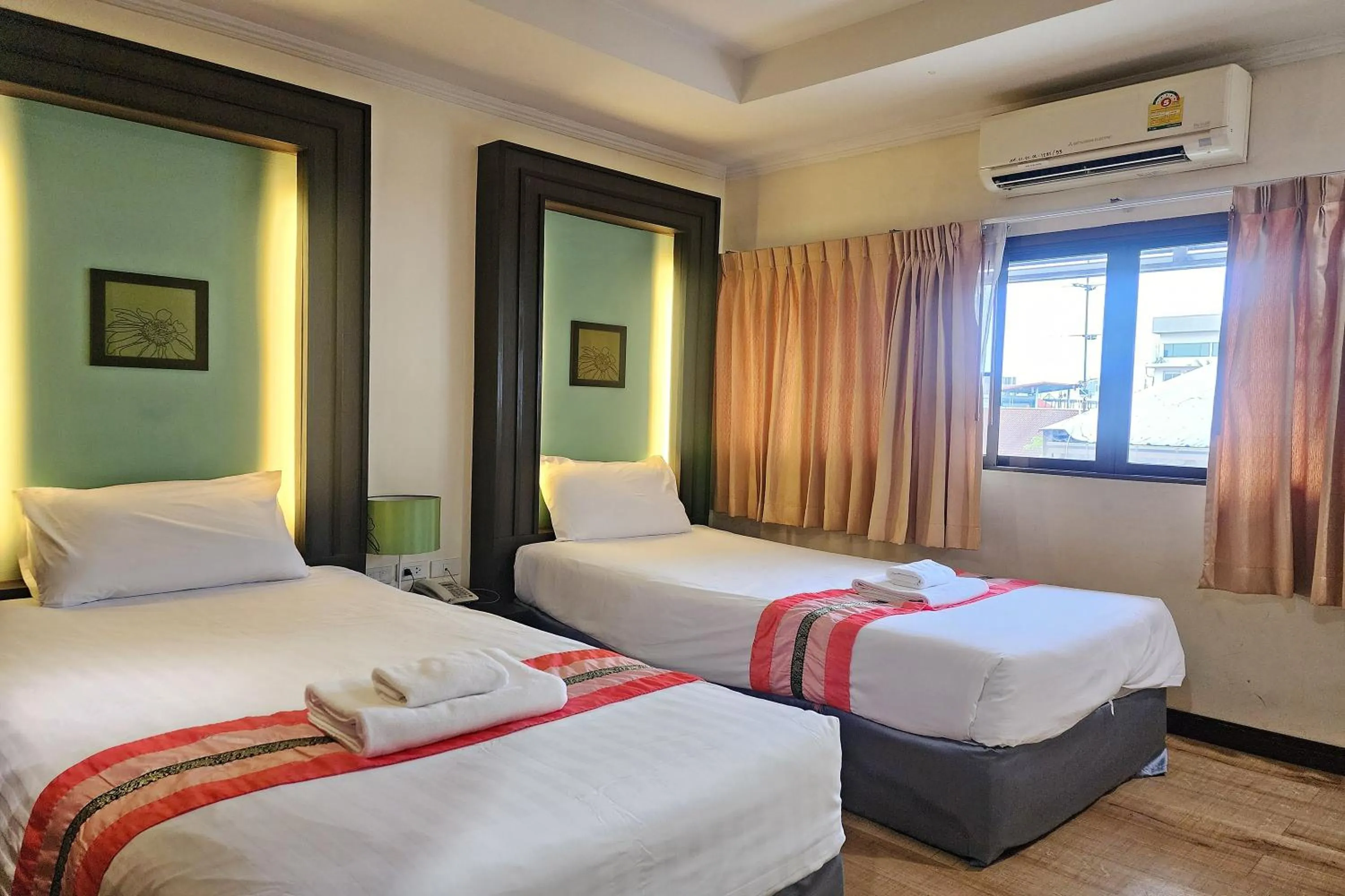 Bed in Suan Sunandha Palace Hotel