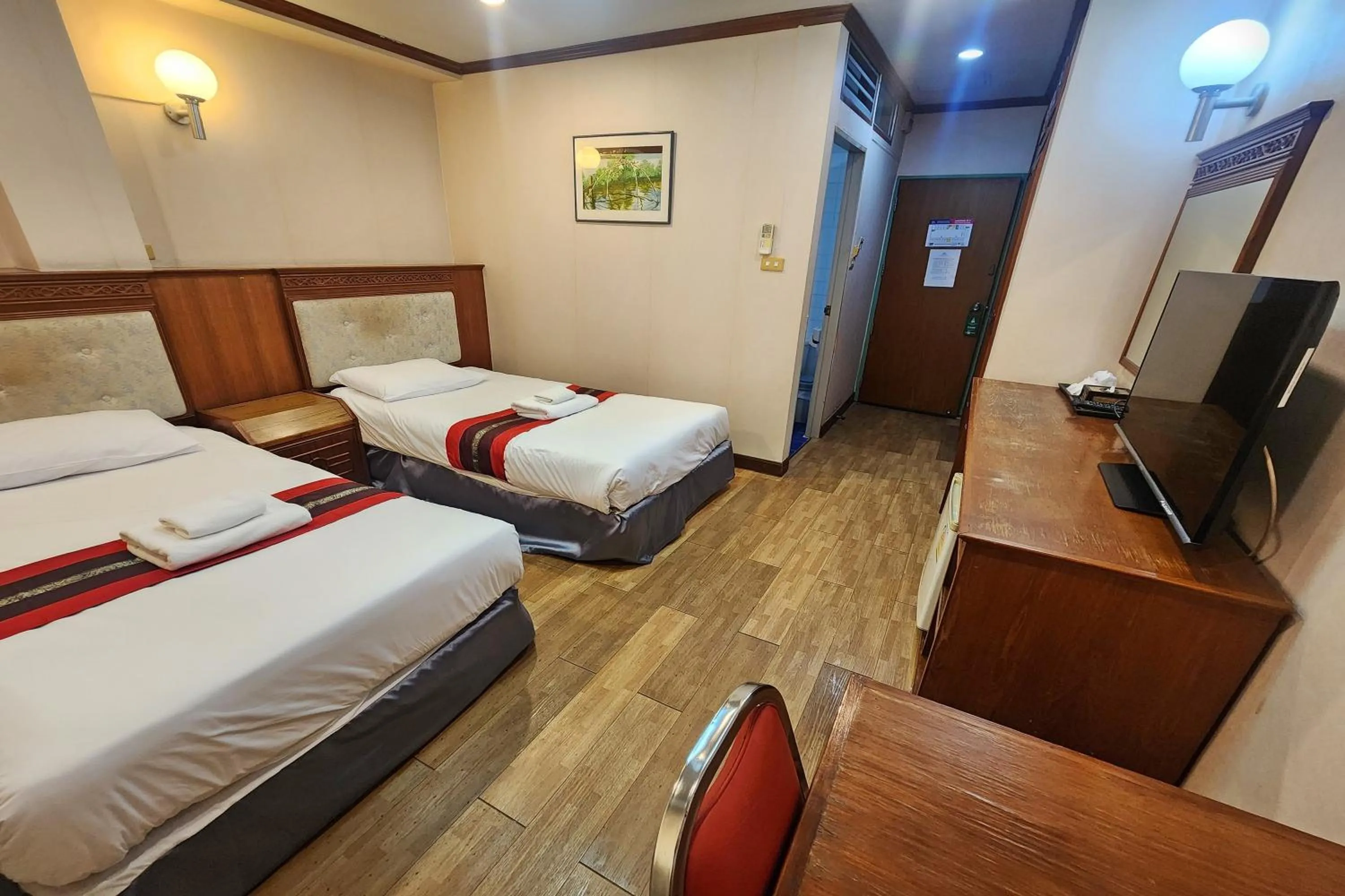 Bed in Suan Sunandha Palace Hotel