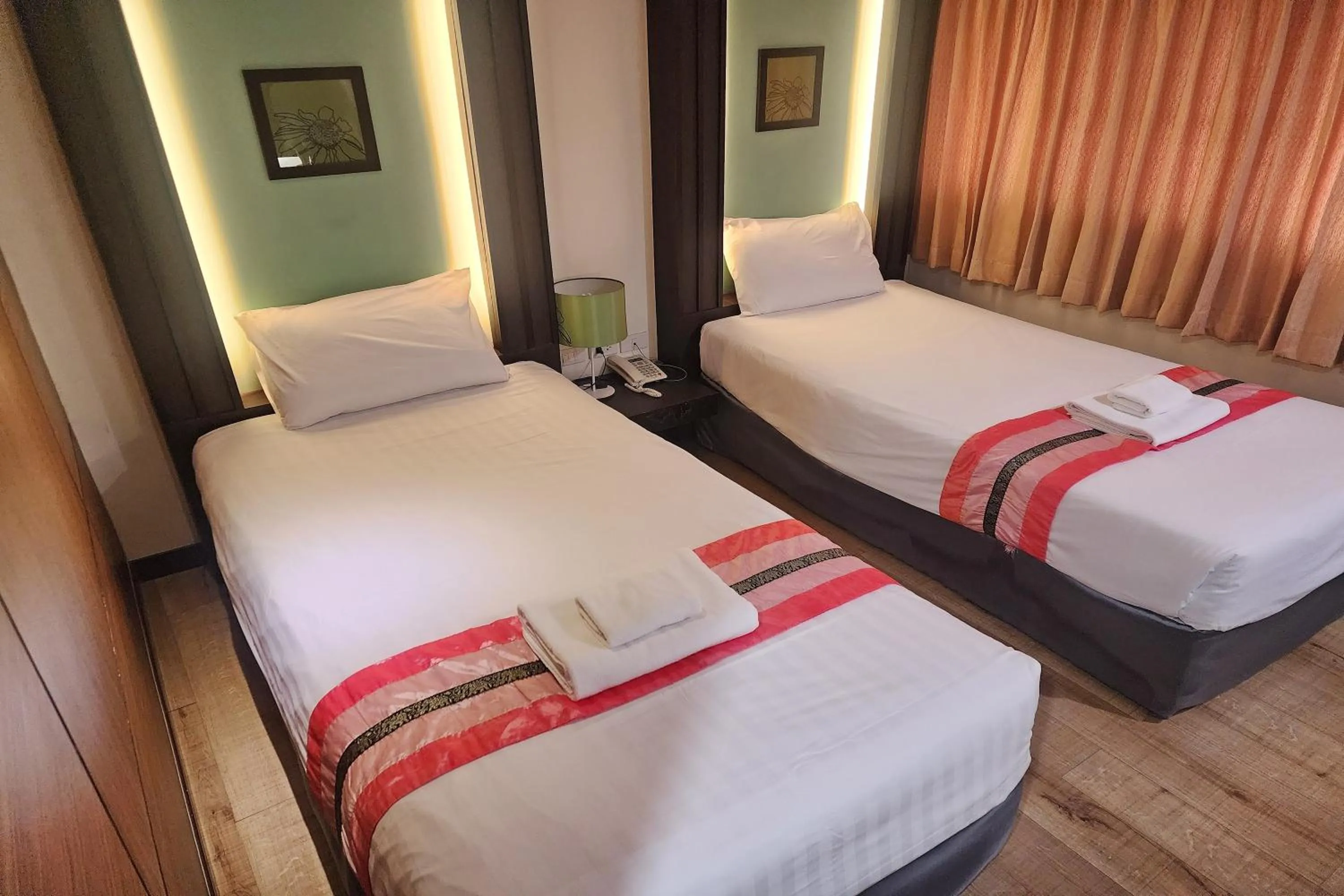 Bed in Suan Sunandha Palace Hotel