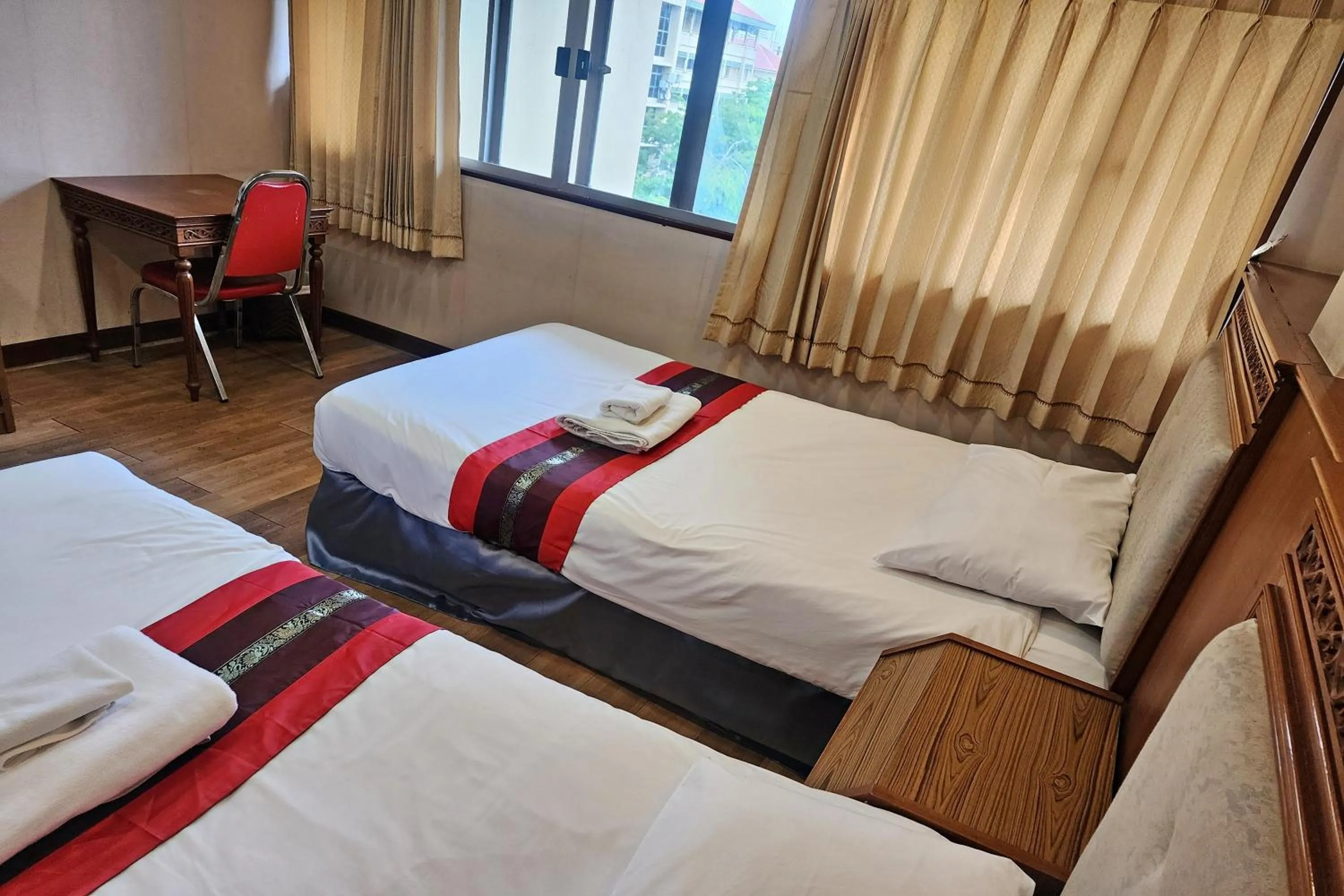 Bed in Suan Sunandha Palace Hotel