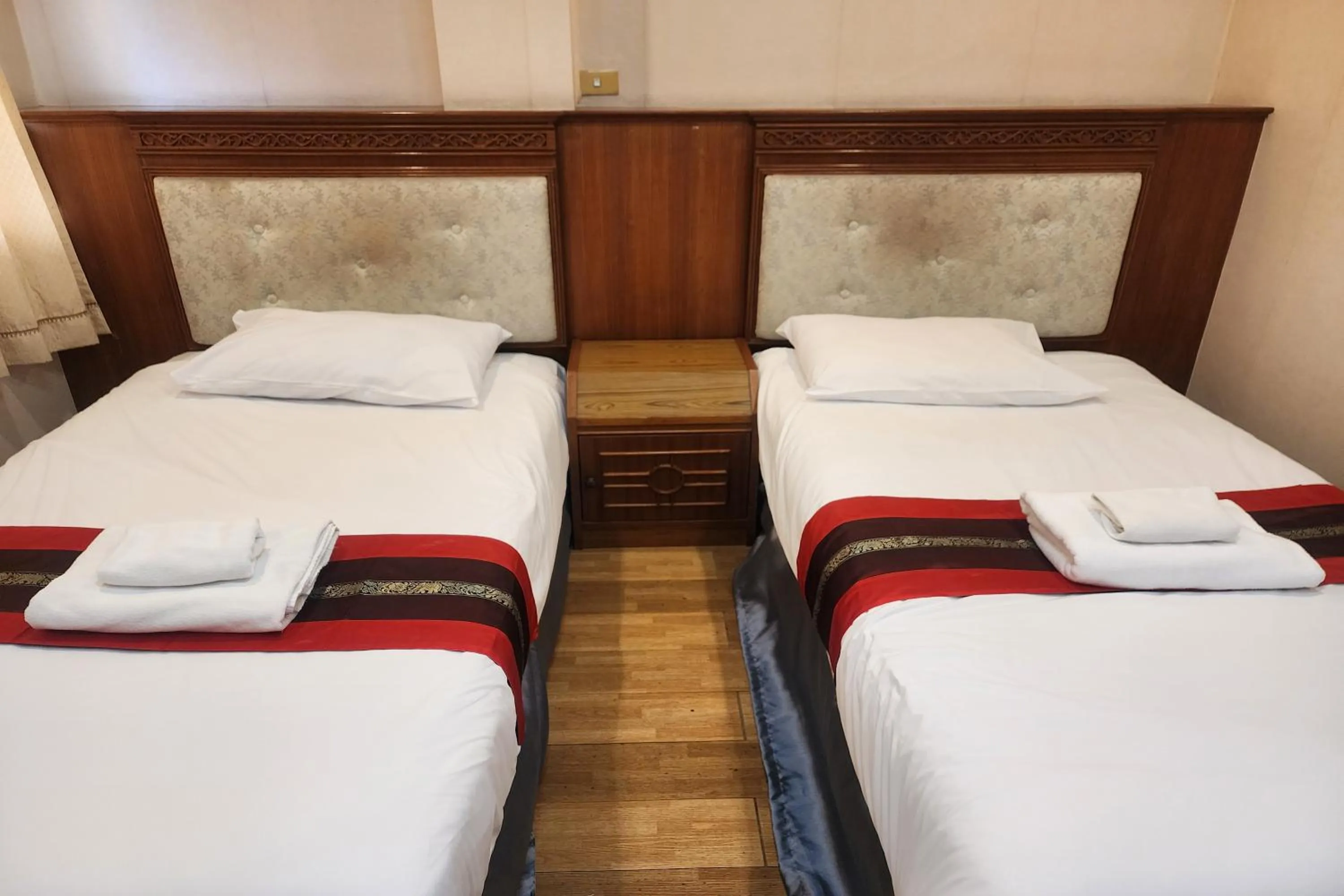 Bed in Suan Sunandha Palace Hotel