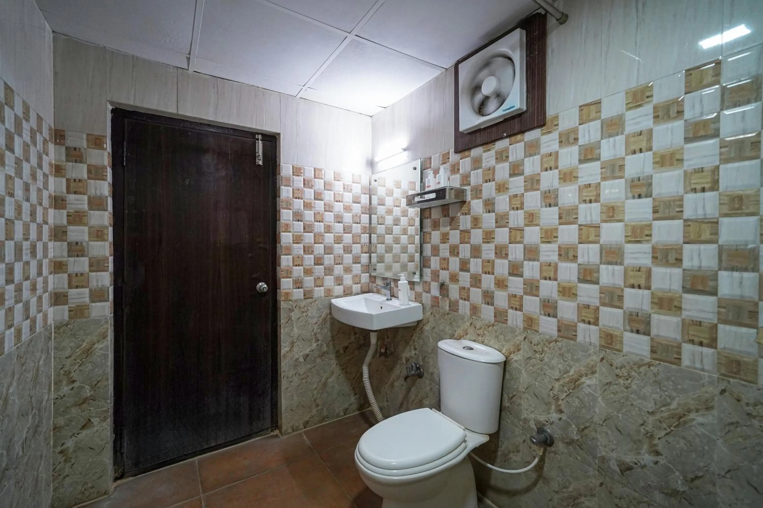 Toilet in Open Hotel by Olive - Oceanic Vibes Hotel - RK Beach
