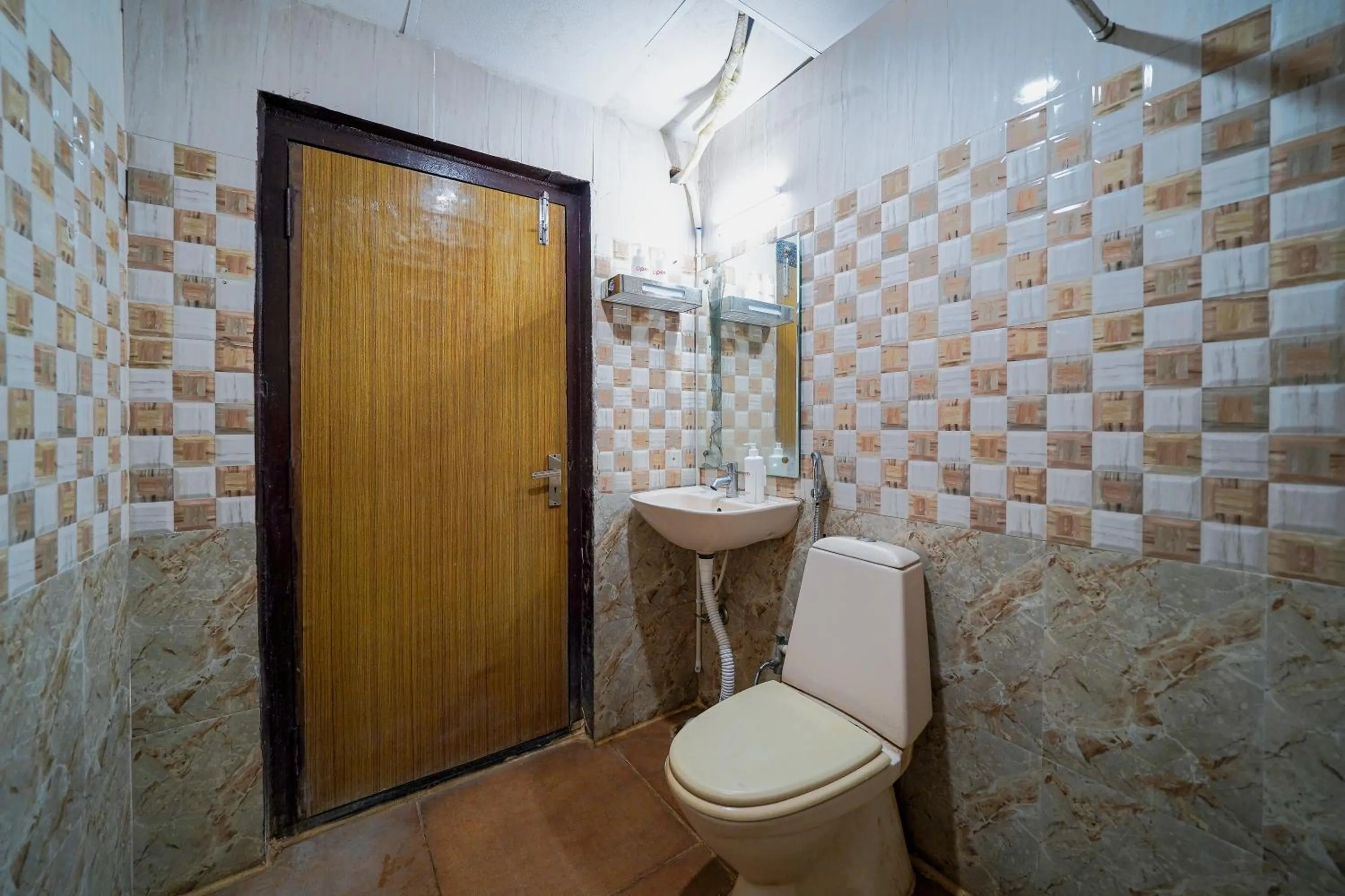 Toilet in Open Hotel by Olive - Oceanic Vibes Hotel - RK Beach