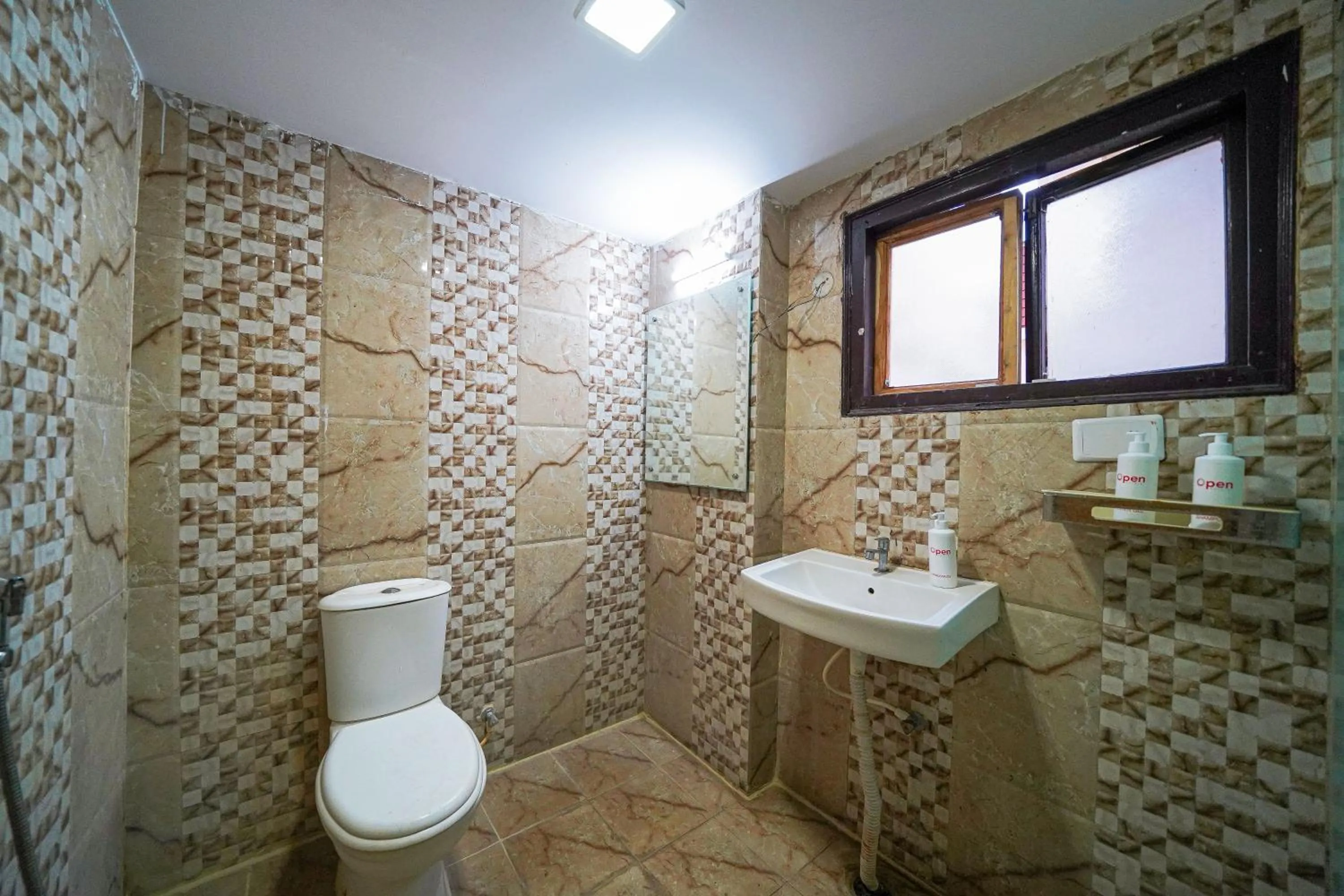 Toilet in Open Hotel by Olive - Oceanic Vibes Hotel - RK Beach