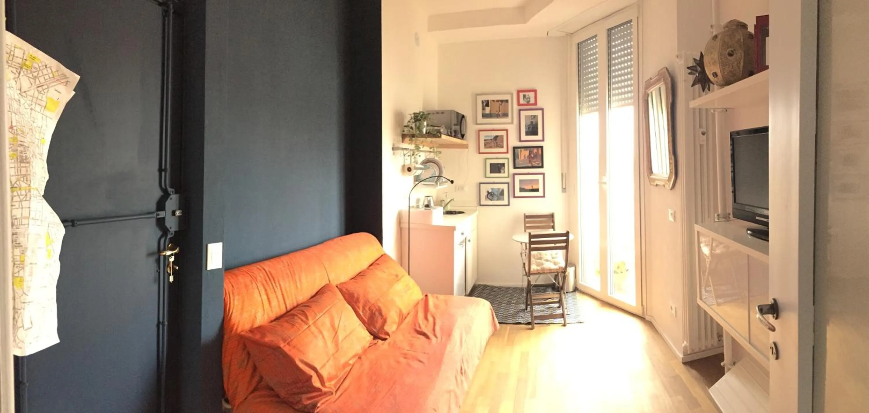 Seating area in Up to Seven