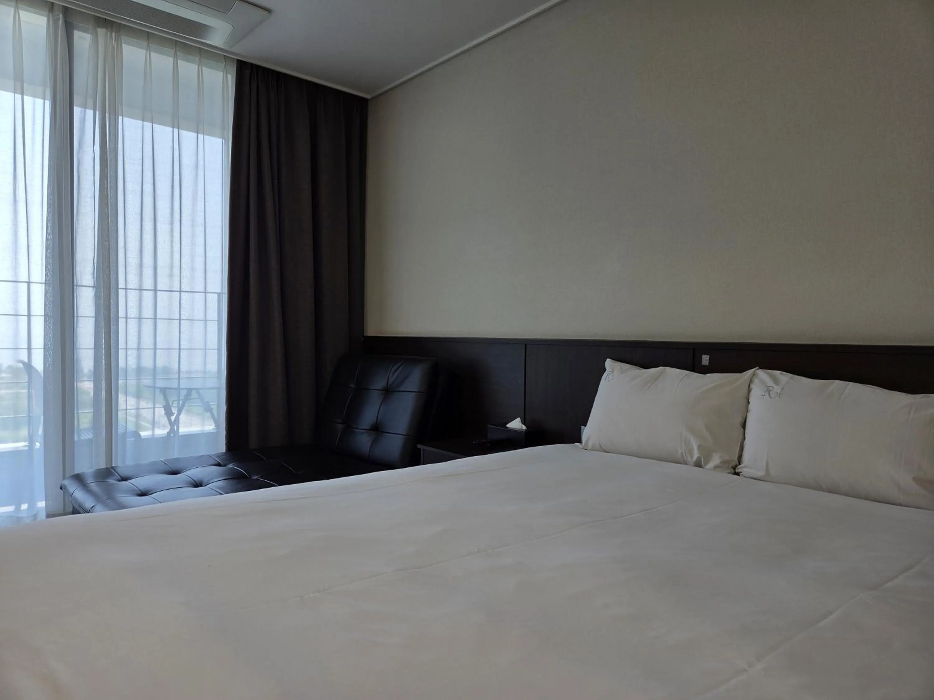 Photo of the whole room, Bed in Riviera Hotel Yeongjong