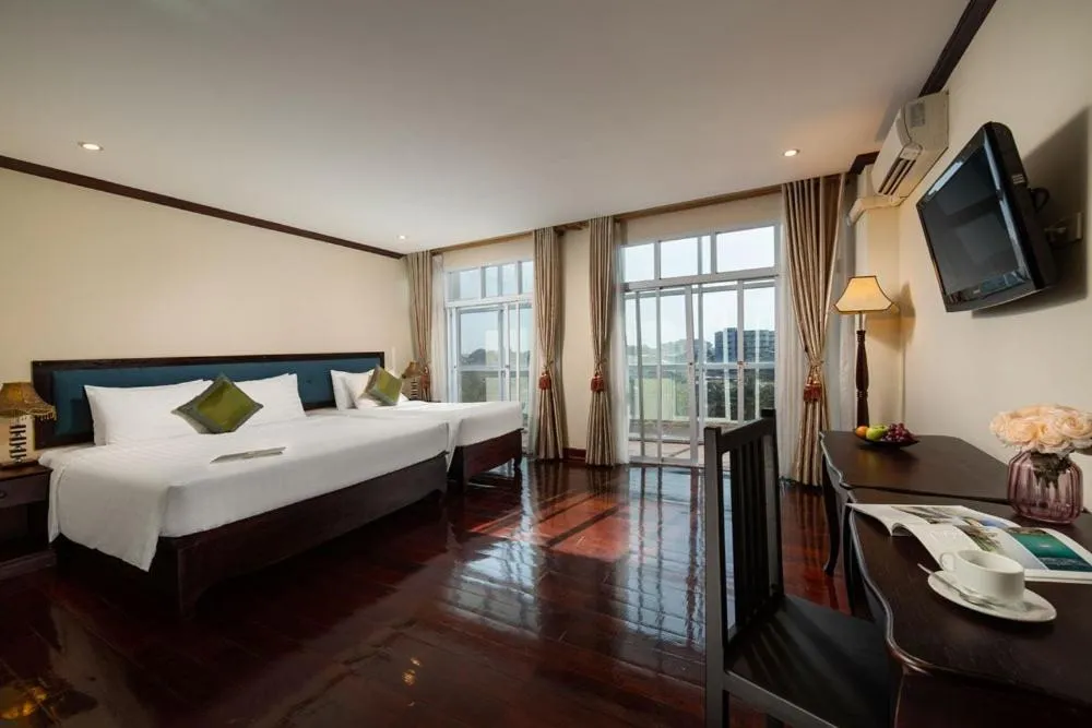 Bed in Vientiane Golden Sun Hotel