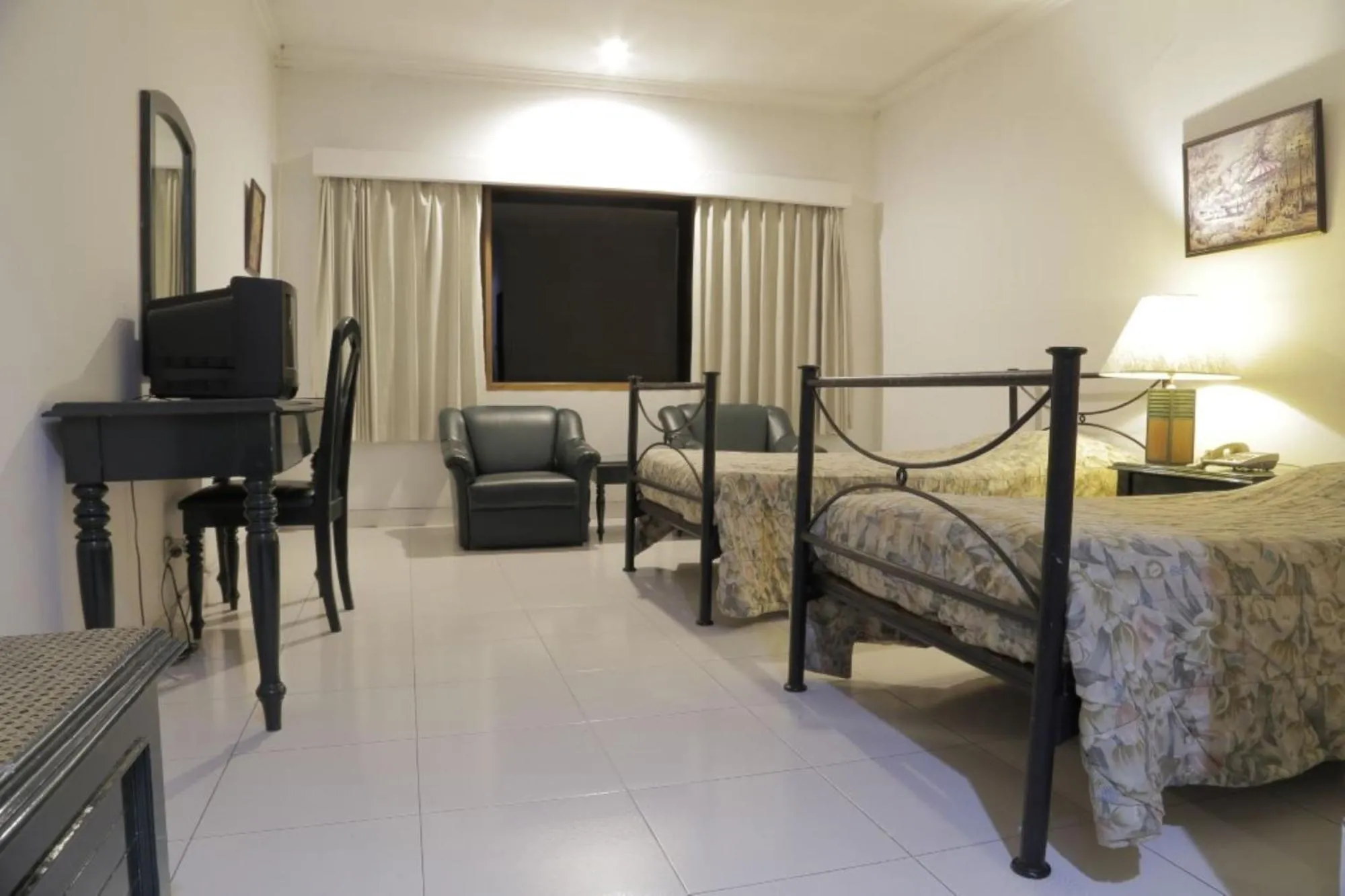 Bed in Graha Asri Hotel