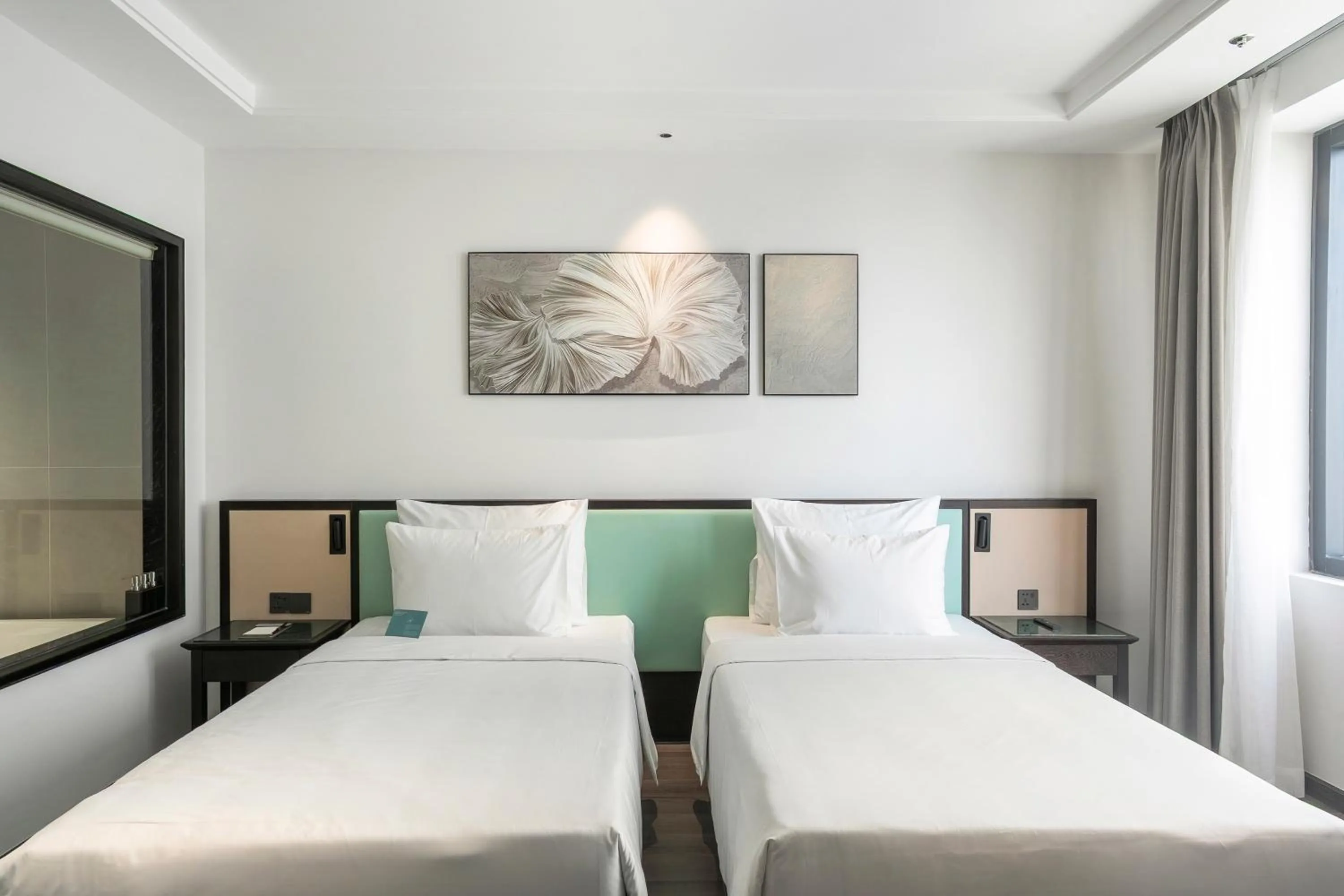 Bed in Iconique Hotel Nha Trang