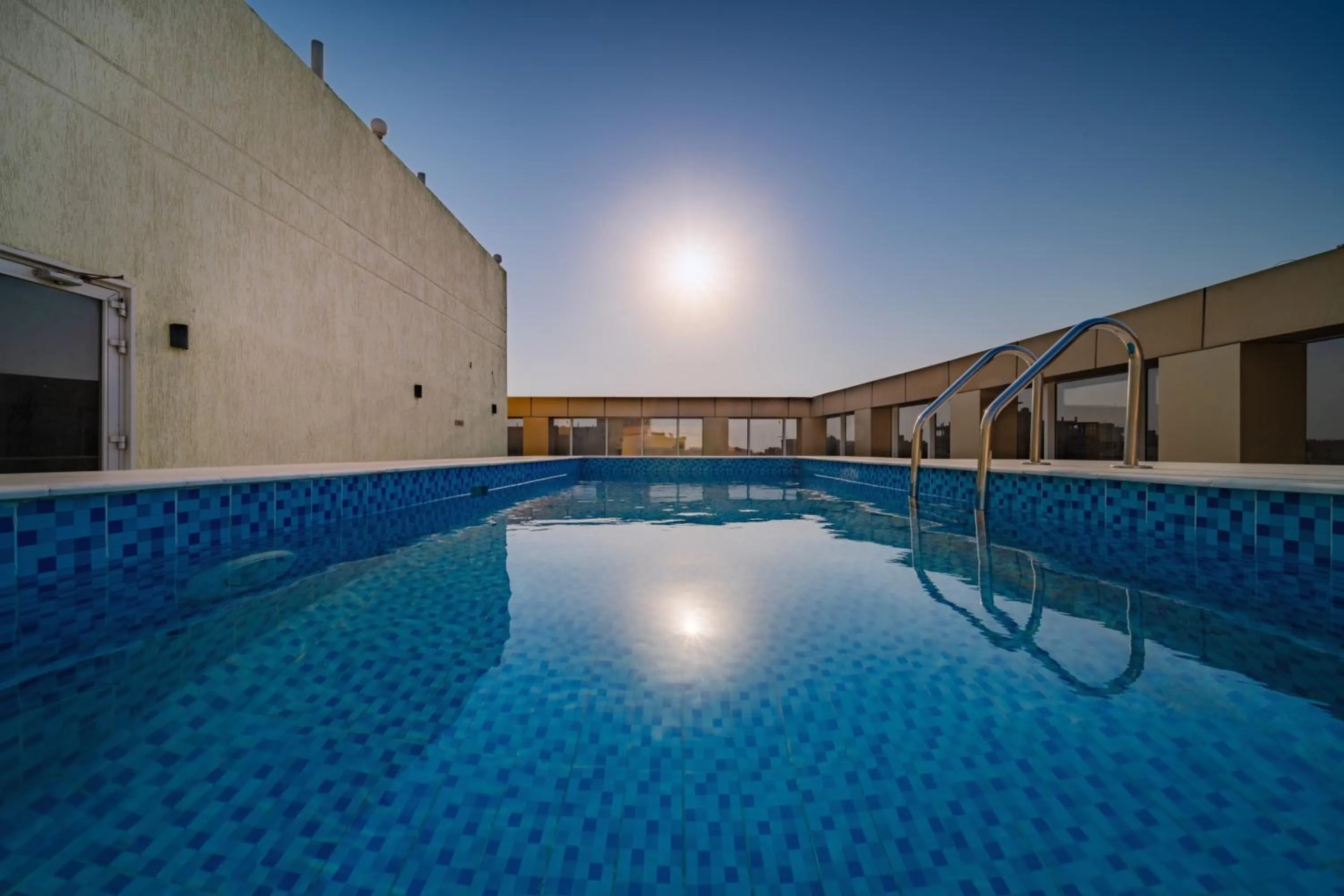 Swimming pool in Sunday Red Sea Fountain Alhamra Formerly Vivid Plaza Hotel