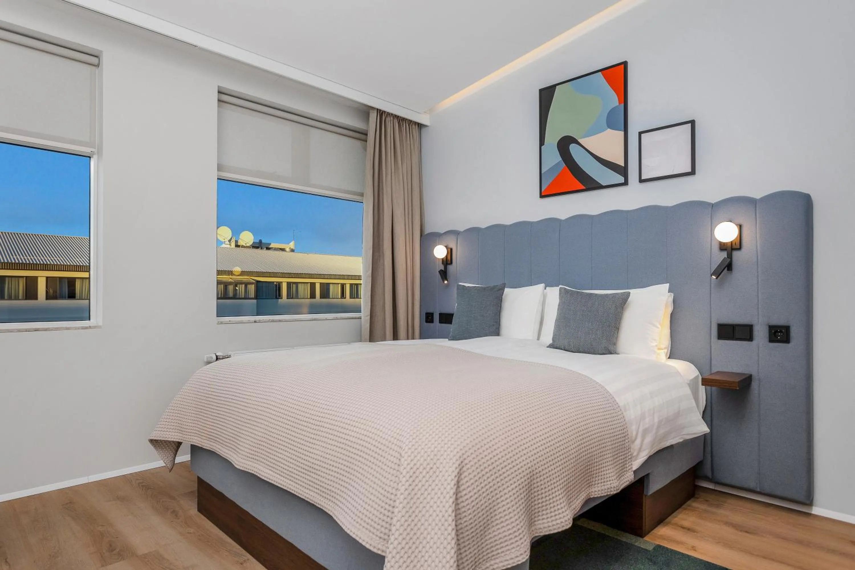 Bed in Candlewood Suites Reykjavik by IHG