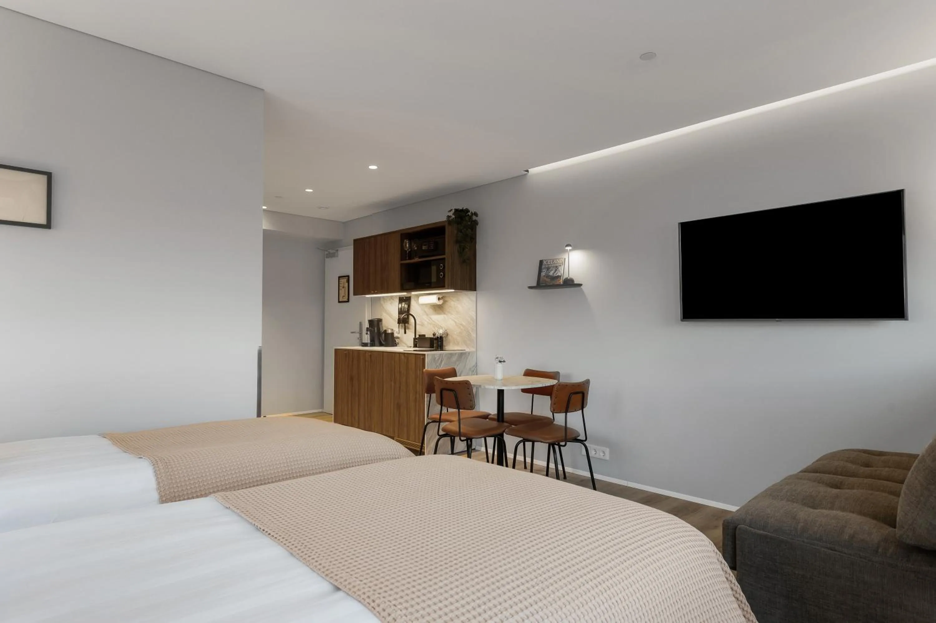 Kitchen or kitchenette, Bed in Candlewood Suites Reykjavik by IHG