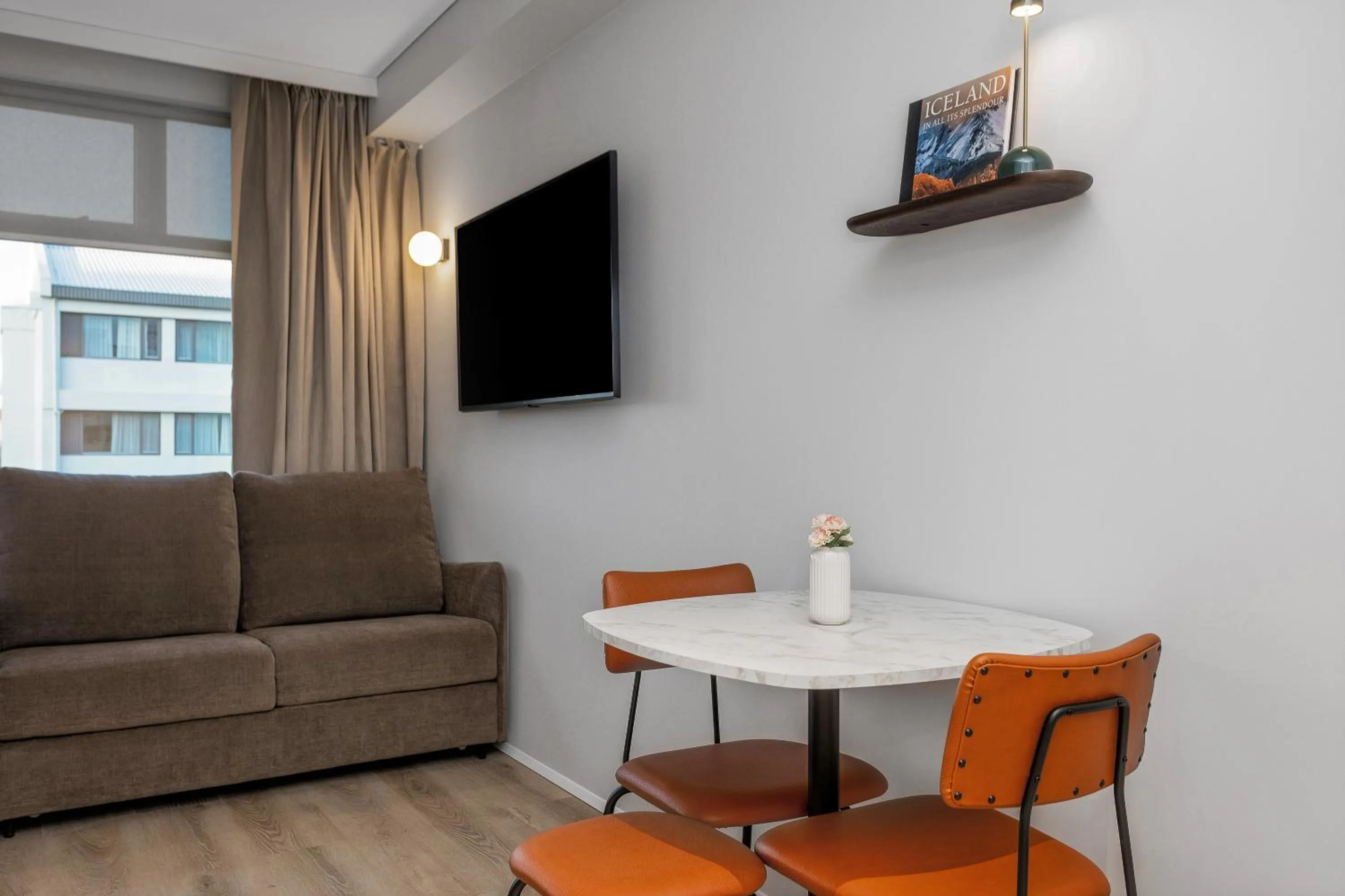 Seating area in Candlewood Suites Reykjavik by IHG