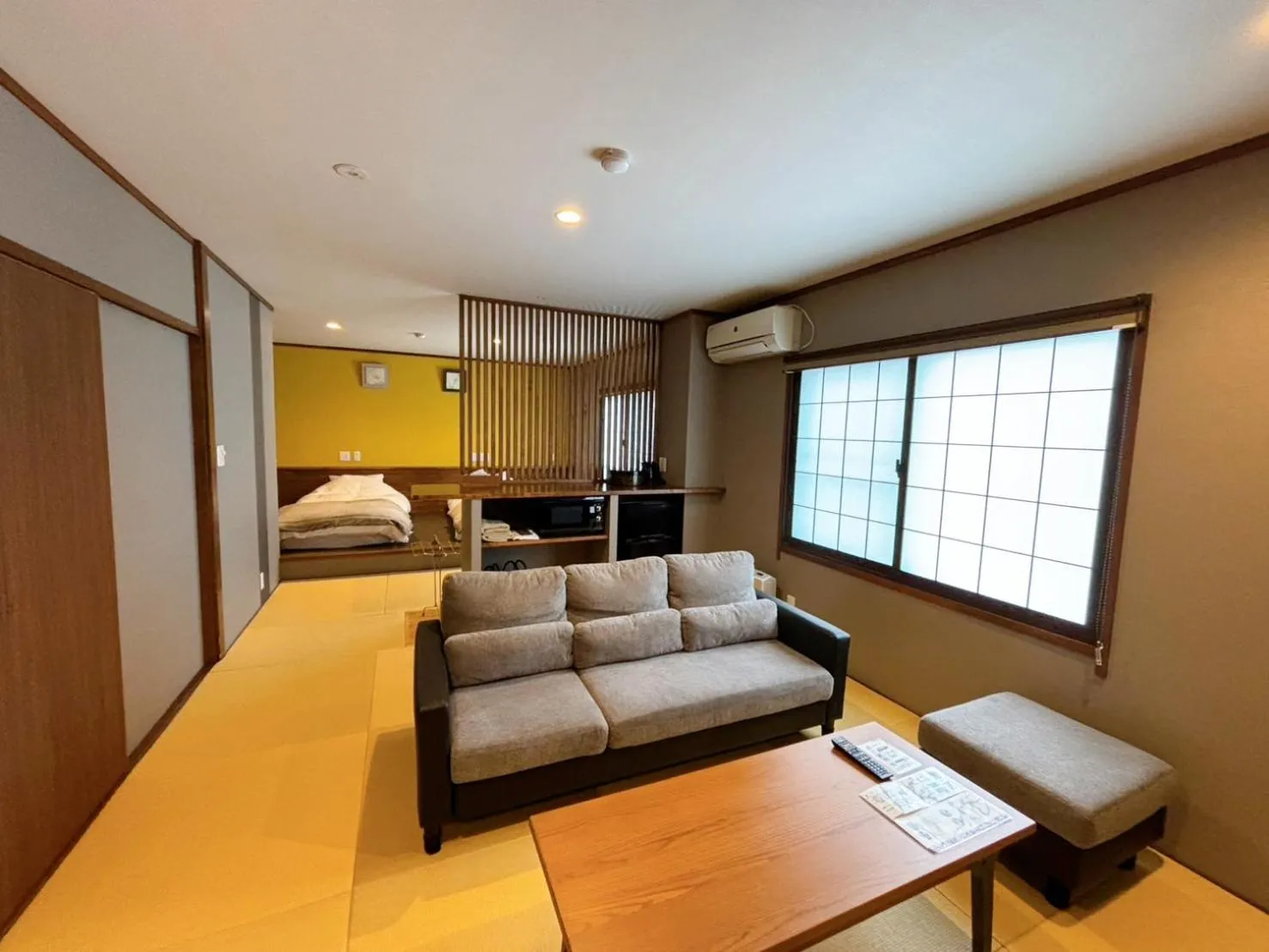 Living room, Bed in Nozawa Onsen Azegamikan