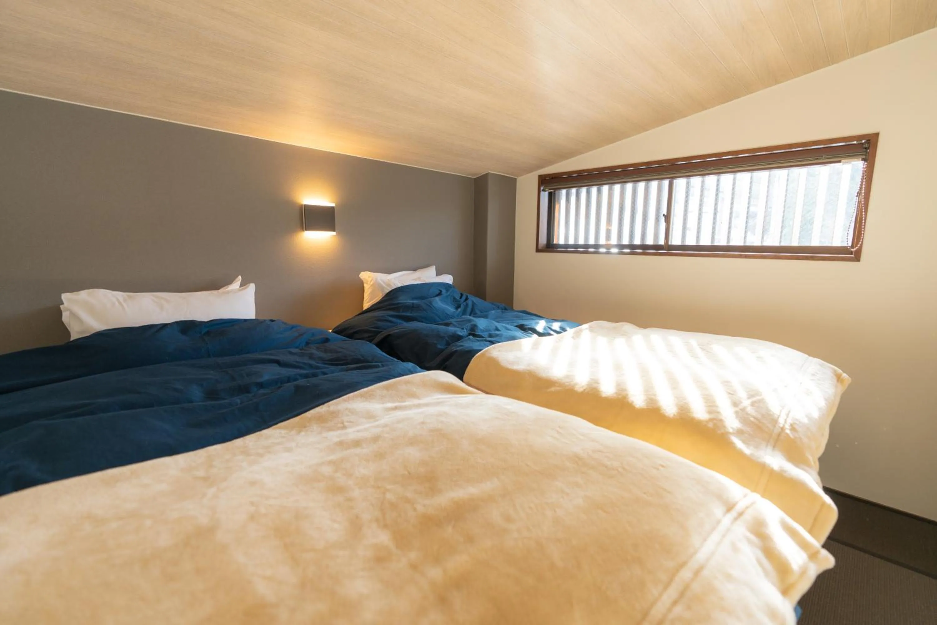 Bed in Nozawa Onsen Azegamikan