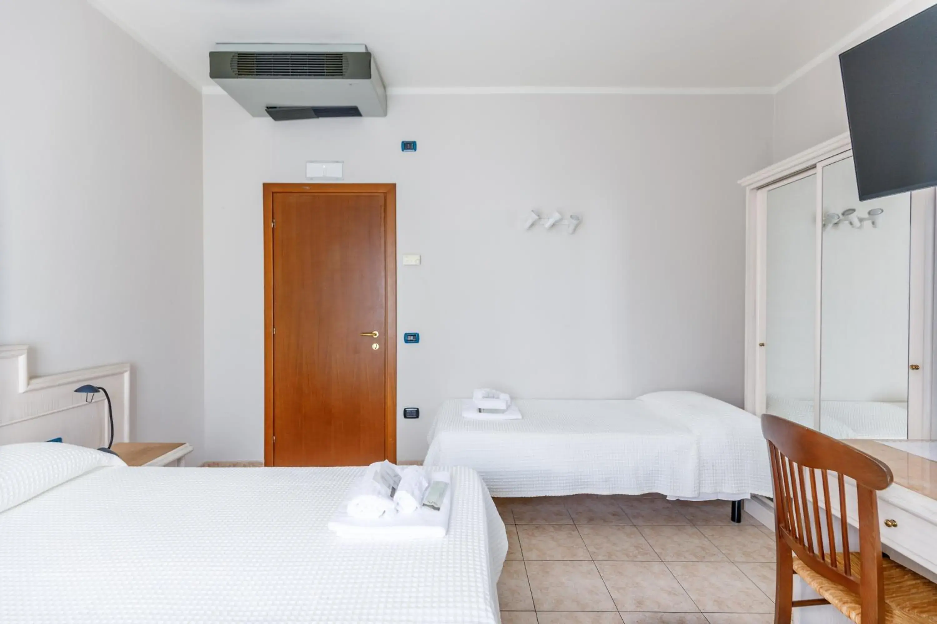 Triple Room in Hotel Classicano Triple Room in Hotel Classicano