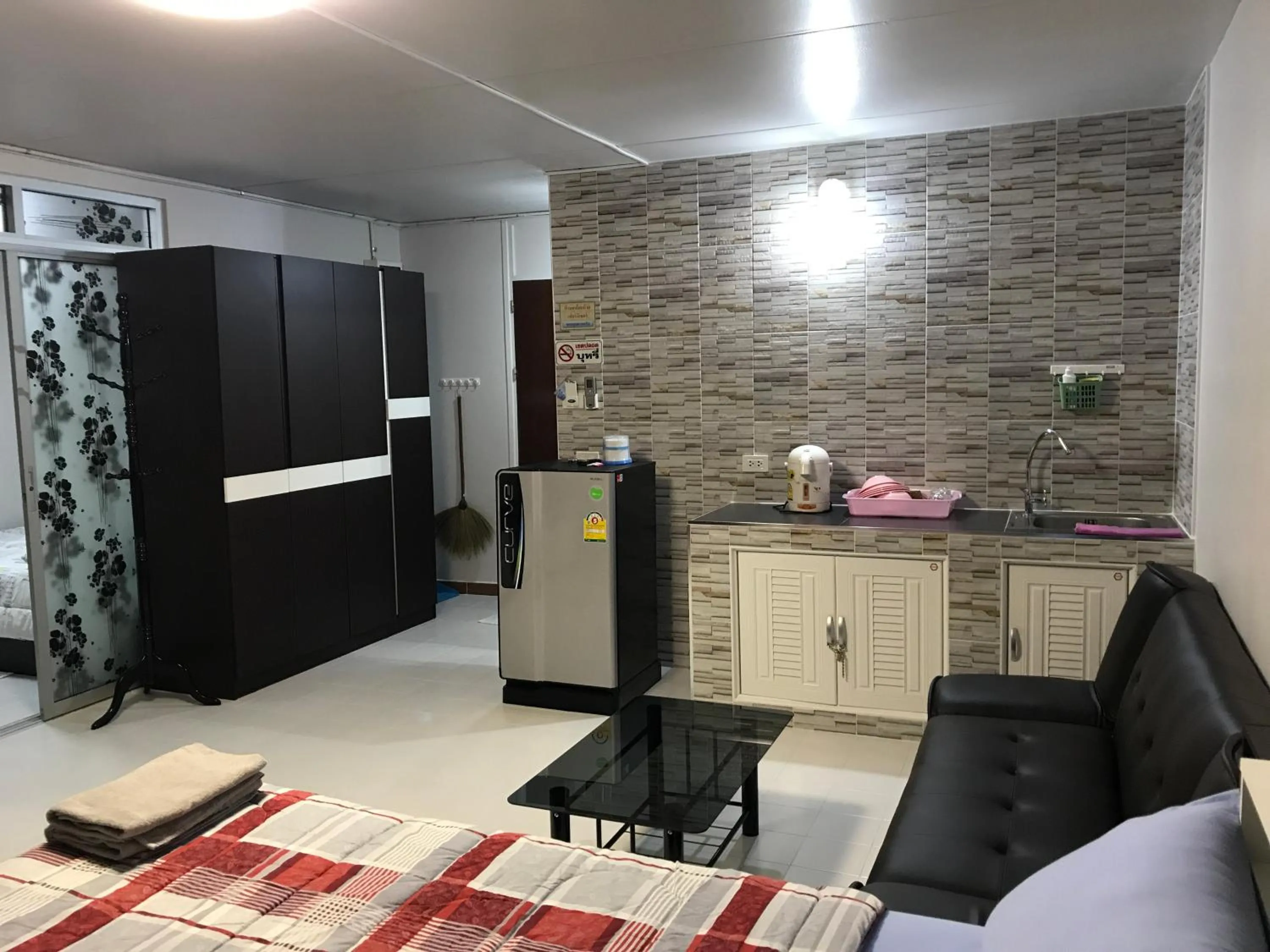 Living room in Muangthongthani Rental/Khun Dan