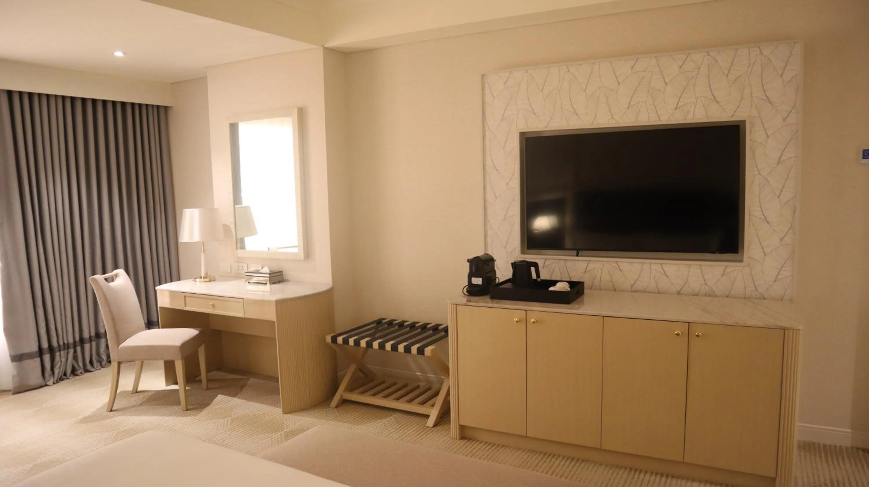 Communal lounge/ TV room in Royce Hotel & Casino