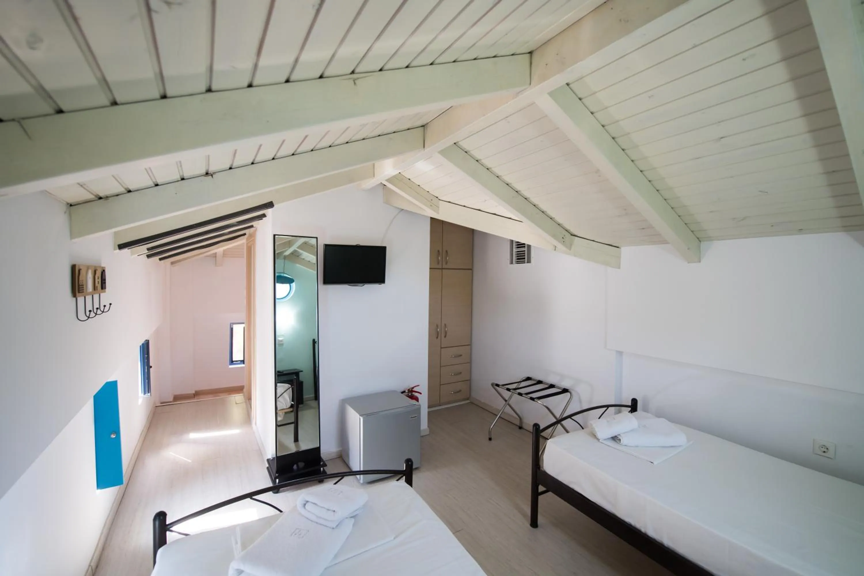 Bed in Ilianthos Apartments & Rooms