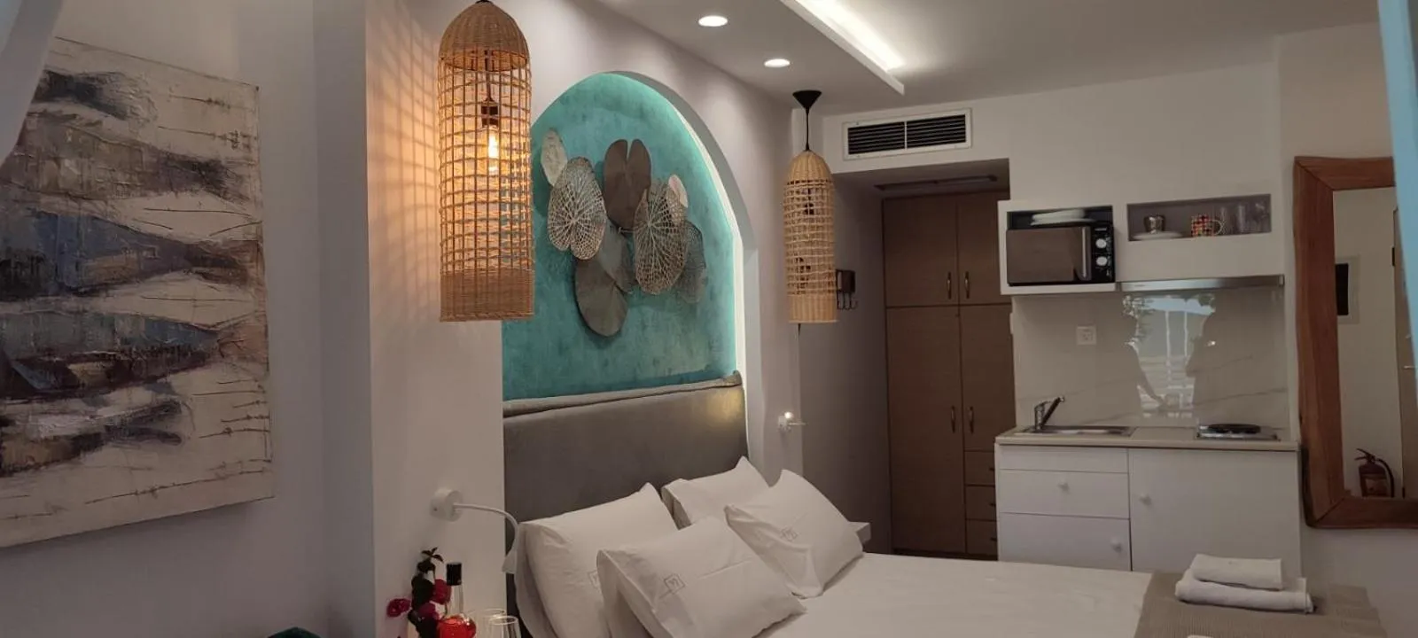 Bed in Ilianthos Apartments & Rooms