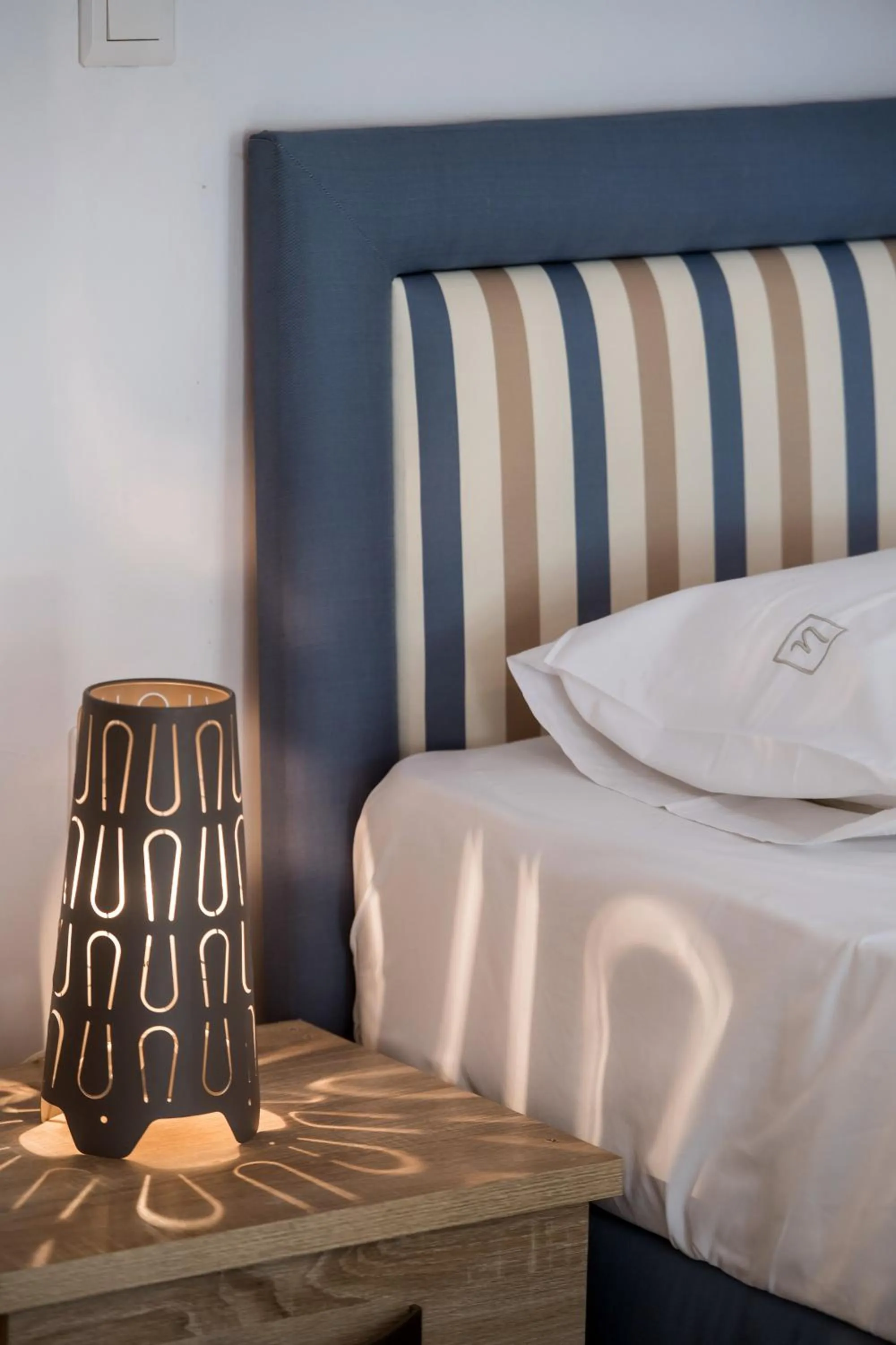 Bed in Ilianthos Apartments & Rooms