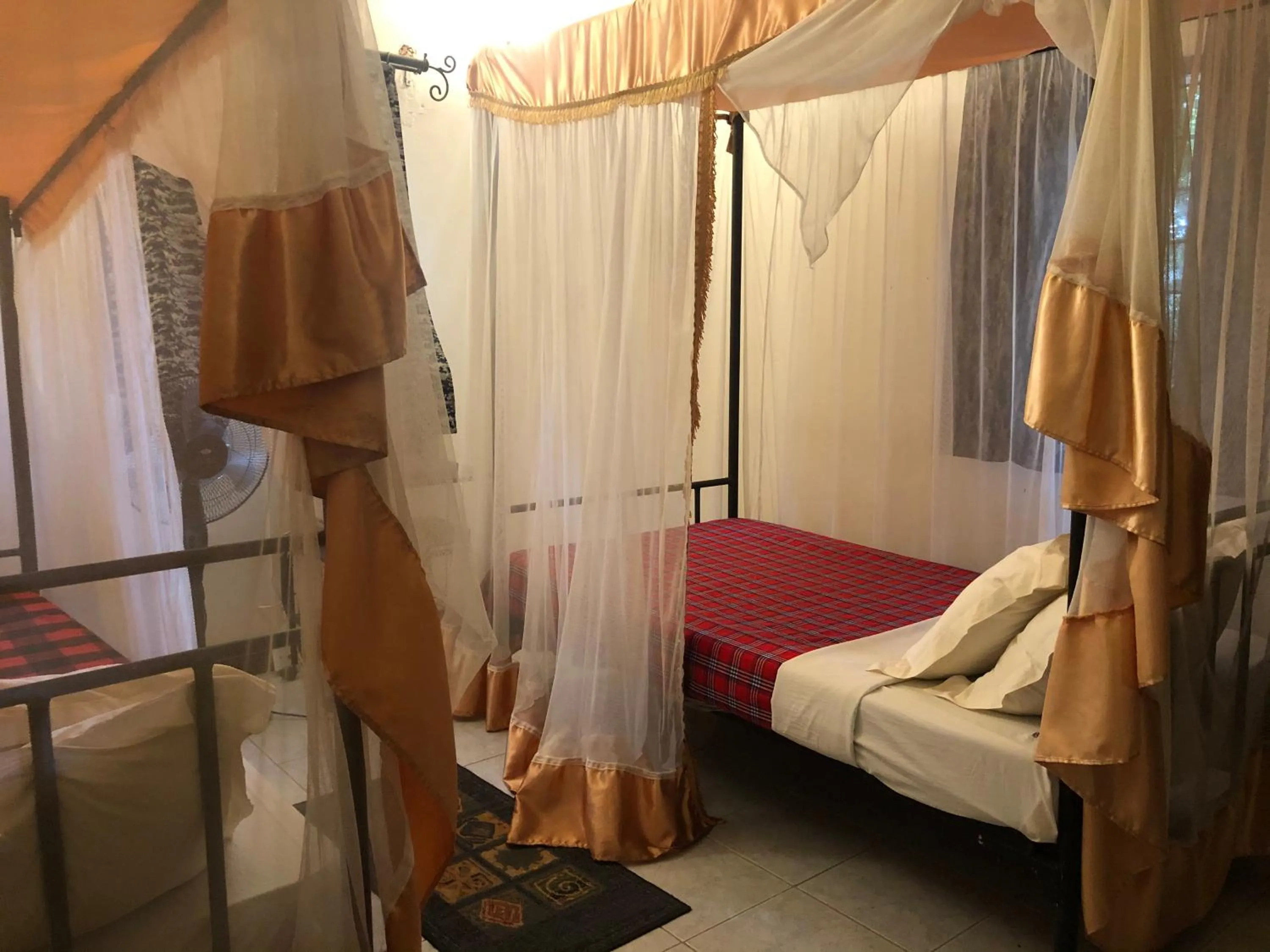 Bed in Impala Safari Lodge