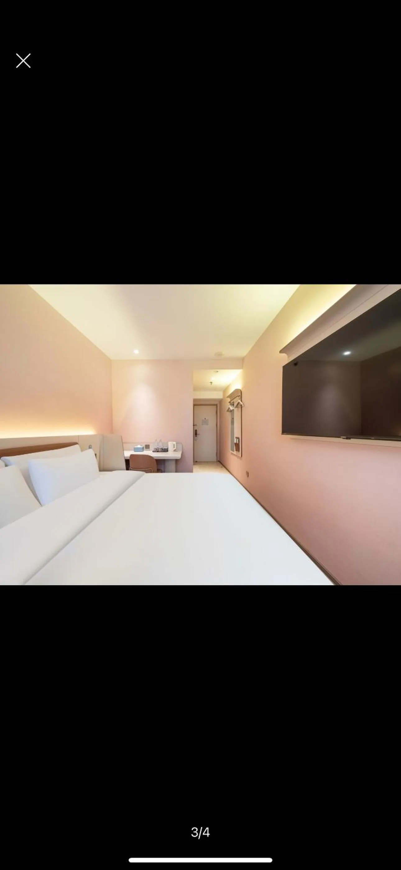 Bed in Hanting Hotel Beijing Tiananmen Square